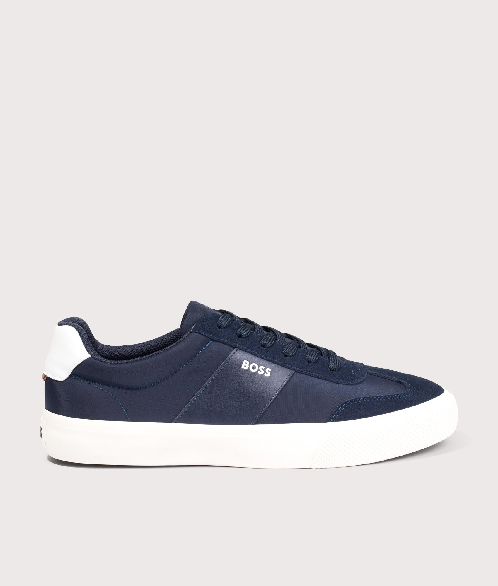 BOSS Aiden Tenn Trainers in Dark Blue at EQVVS Menswear. Side shot.