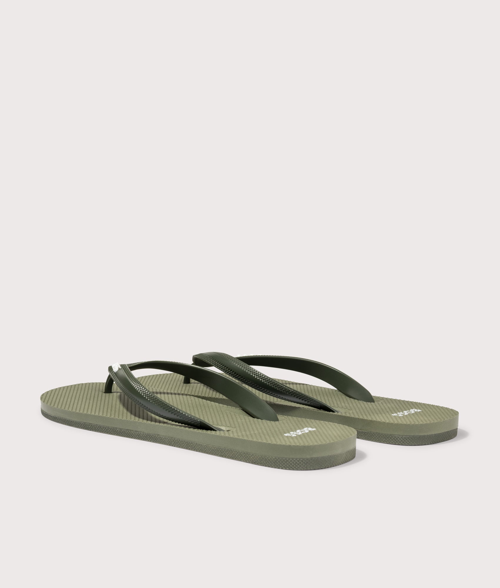 BOSS Tracy Branded Strap Flip Flops in Open Green at EQVVS Menswear. Angled back shot.