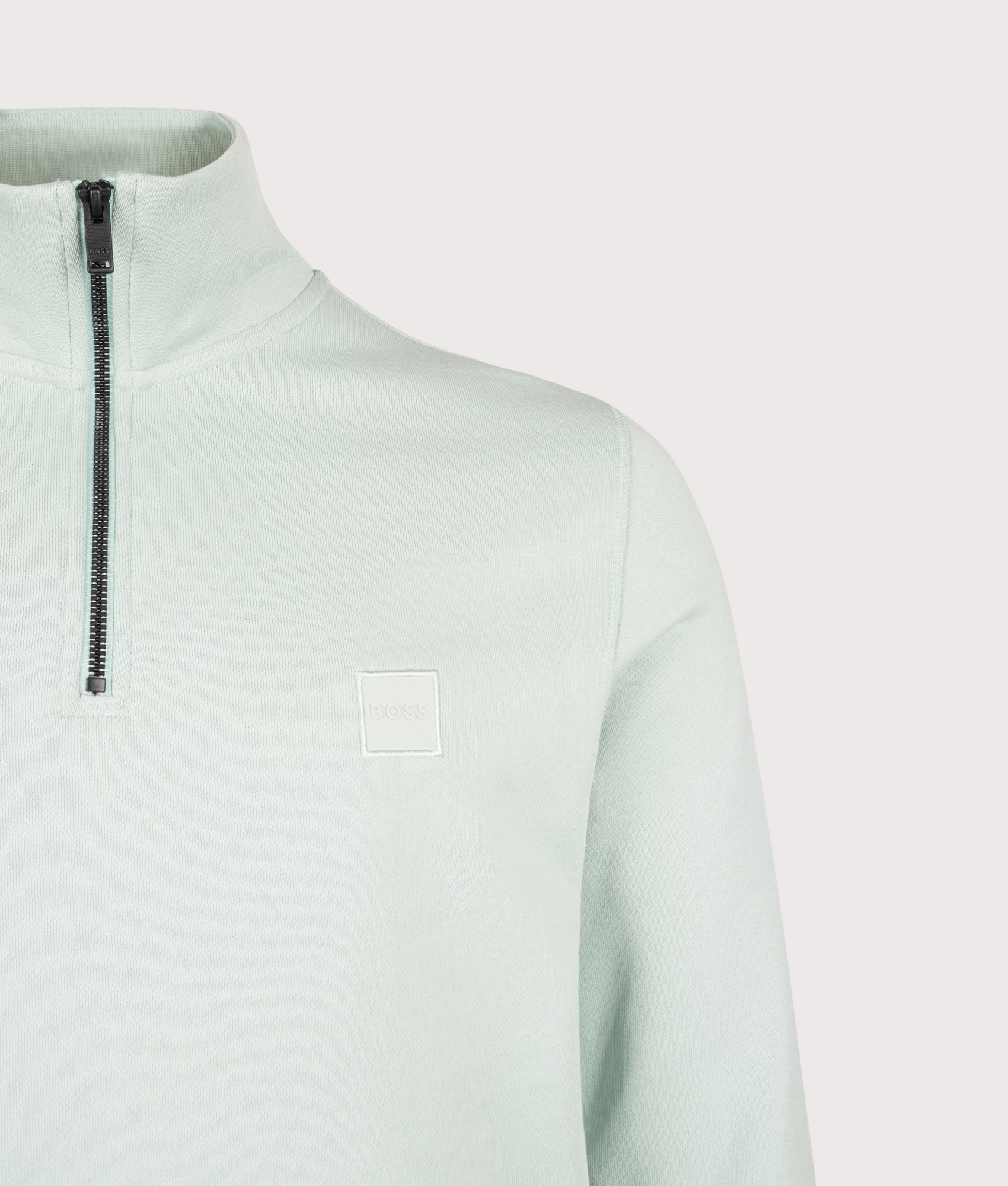BOSS Quarter Zip Zetrust Sweatshirt in Turquoise/Aqua at EQVVS Menswear. Detail shot.