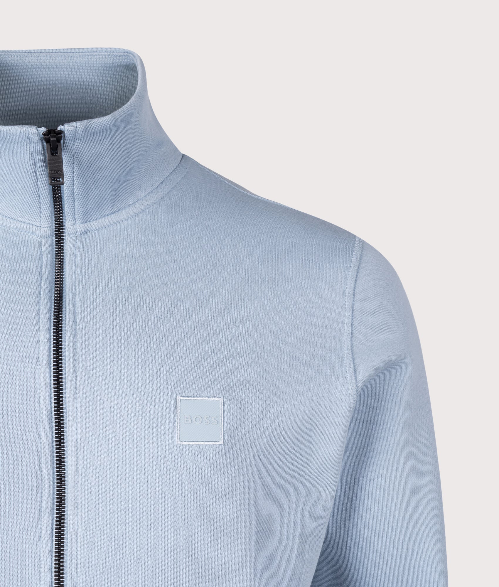 BOSS Zestart Zip Through Sweatshirt in Light/Pastel Blue at EQVVS Menswear. Detail shot.