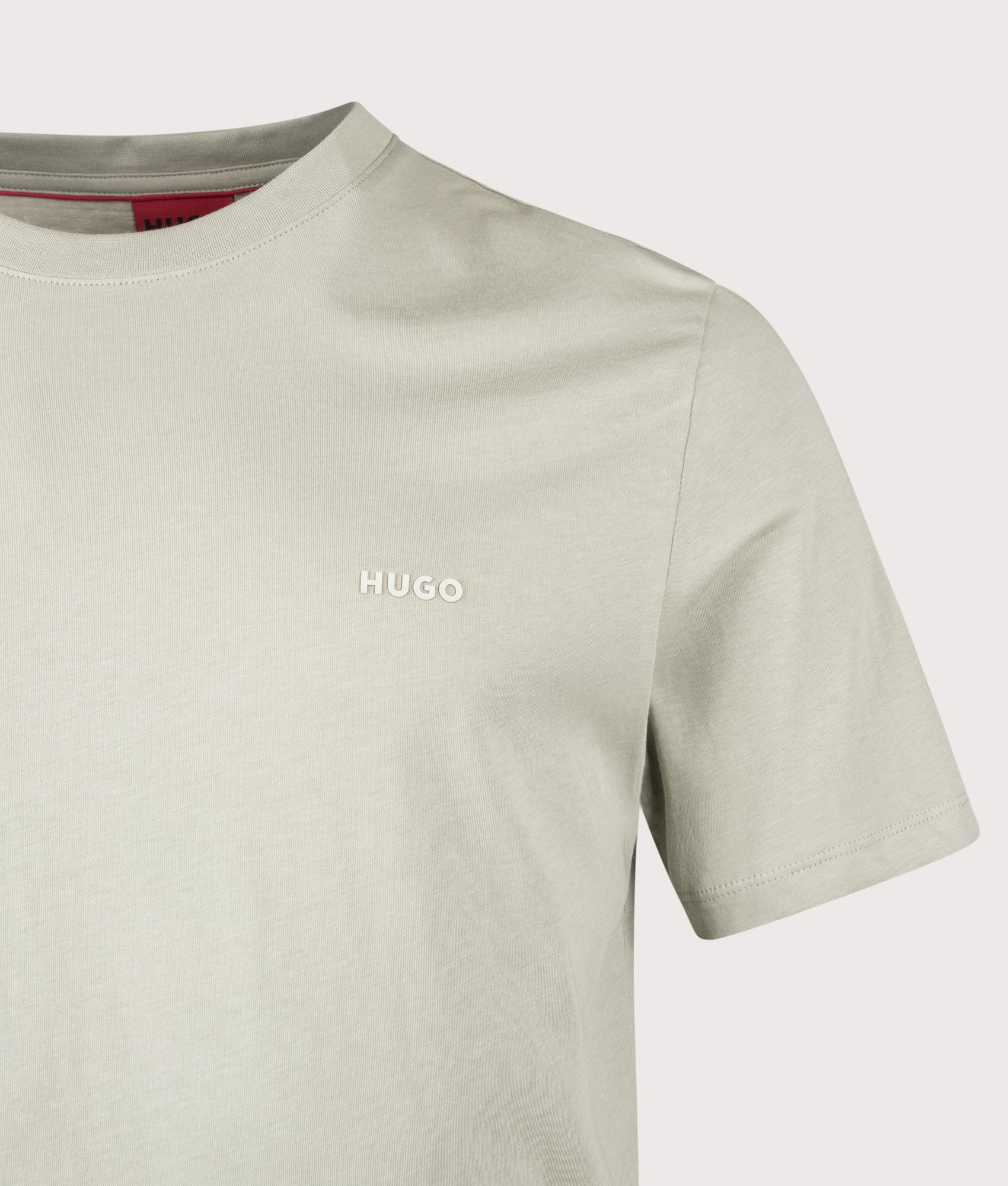 Dero222 T-Shirt in Light/Pastel Green by HUGO. Shot by EQVVS. Detail shot.