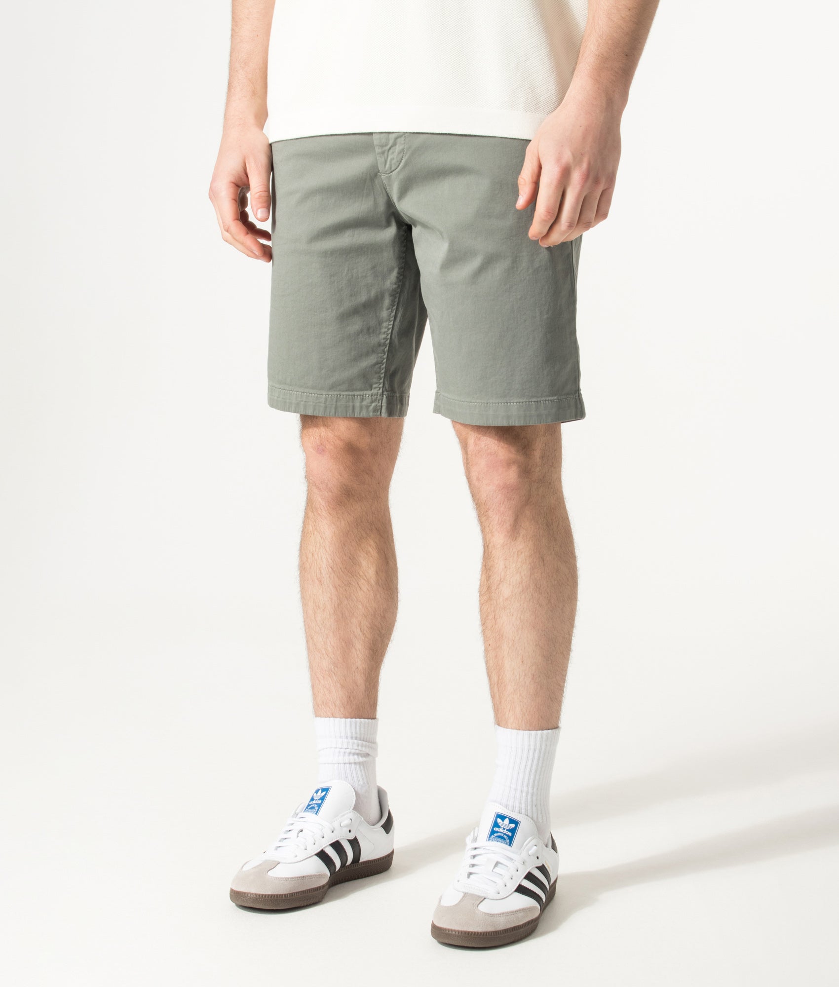 BOSS Slim Fit Chino Shorts in Open Grey at EQVVS Menswear. Model front shop. 