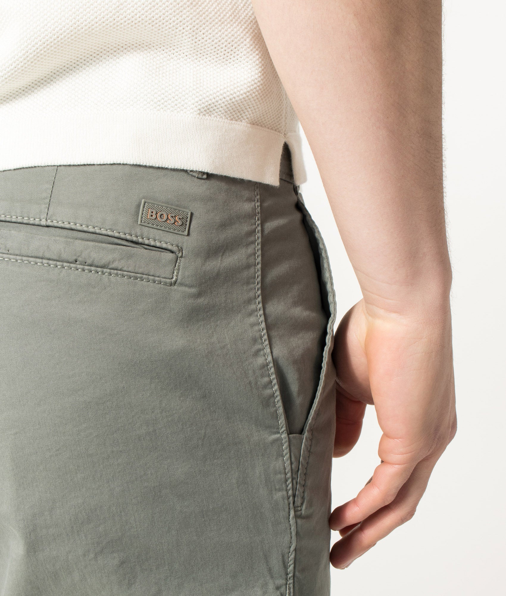 BOSS Slim Fit Chino Shorts in Open Grey at EQVVS Menswear. Detail shot.
