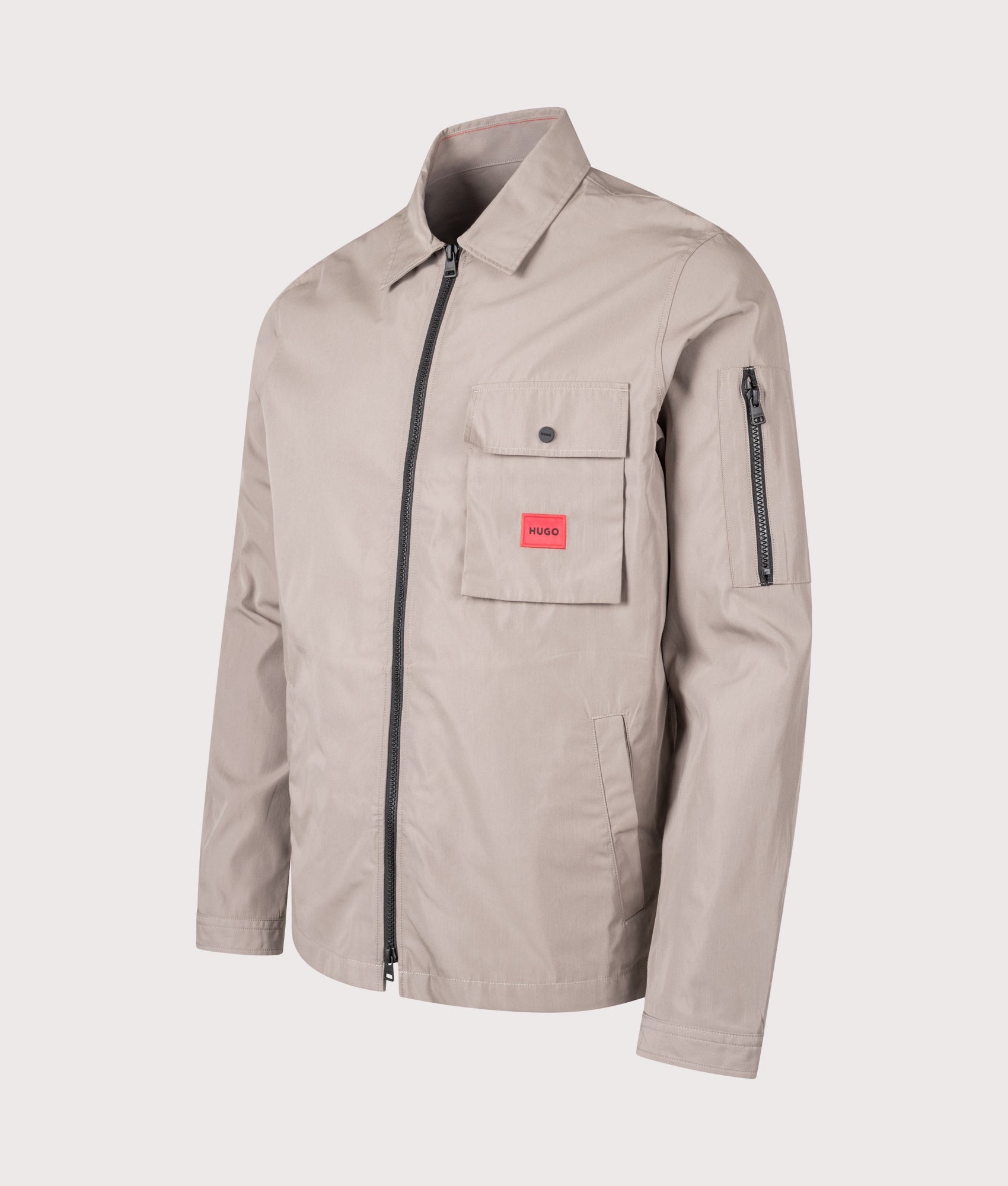 HUGO Zip Through Emmond Overshirt in Light/Pastel Brown at EQVVS Menswear. Angled front shot.