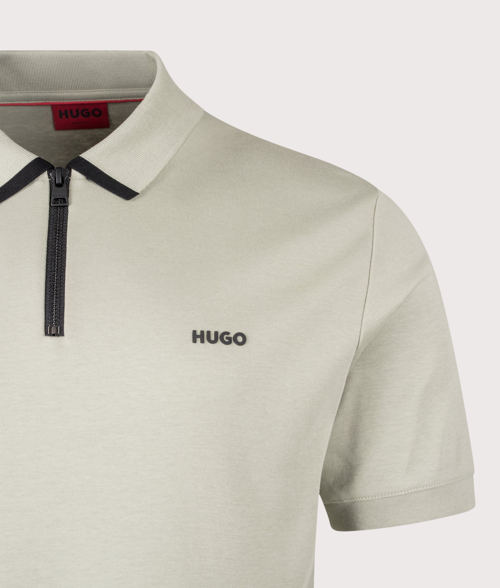 Dalomino Polo Shirt in Light/Pastel Green by HUGO. Shot by EQVVS. Detail shot.