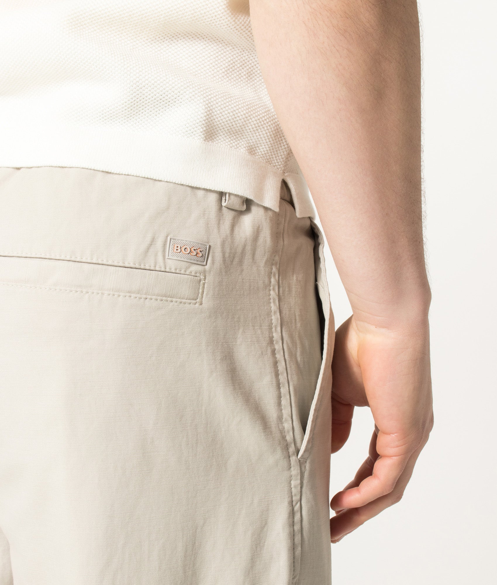 Regular Fit Chinos in Open Grey by BOSS. Shot by EQVVS. Detail shot.