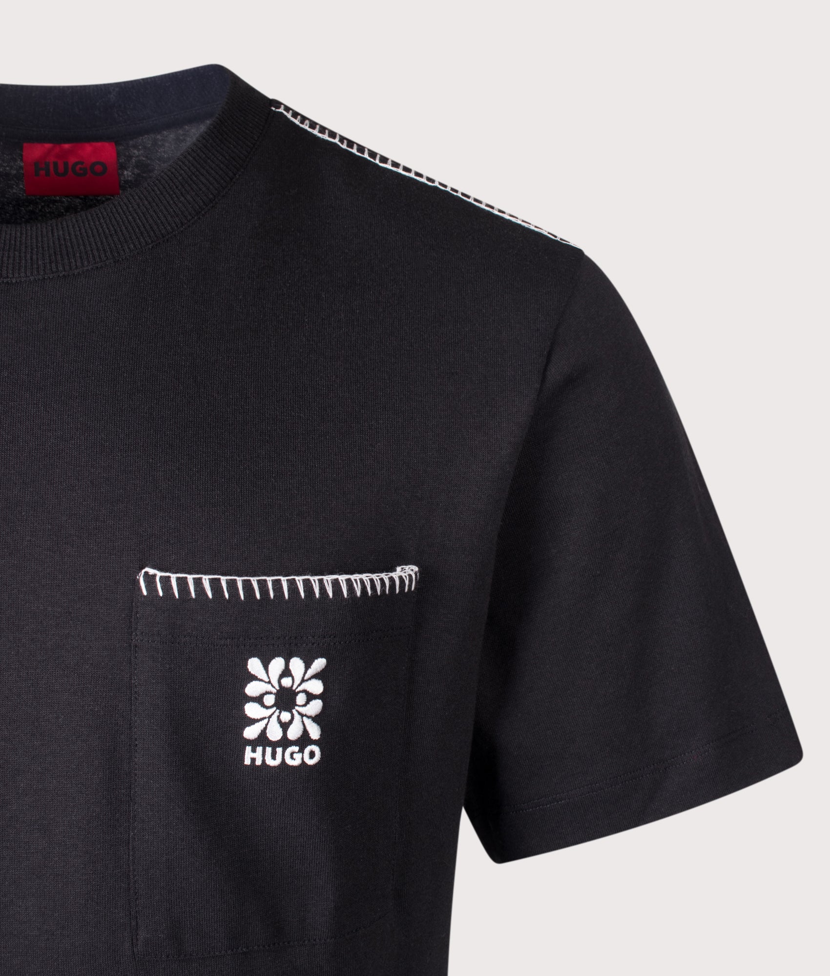 Relaxed Fit Darro T-Shirt in Black by HUGO. Shot by EQVVS. Detail shot.