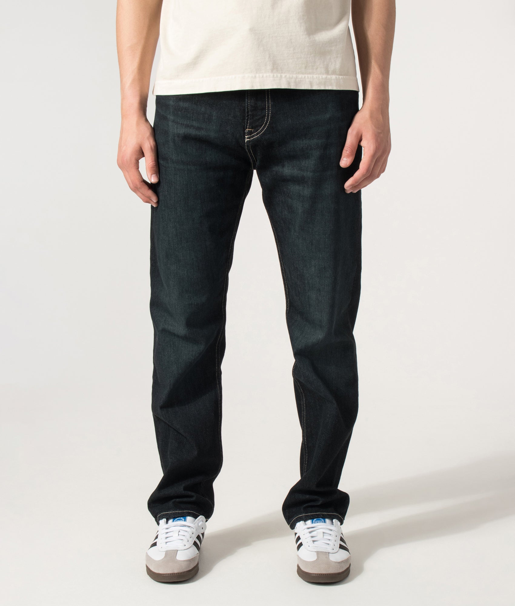 BOSS Ogden 3 Straight Leg Jeans in Dark Blue at EQVVS Menswear. Front detail shot.