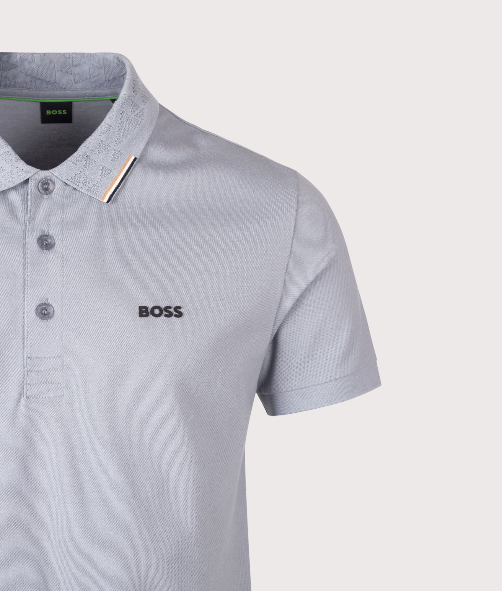 BOSS Swing Paddy Polo Shirt in Dark Grey at EQVVS Menswear. Detail shot.
