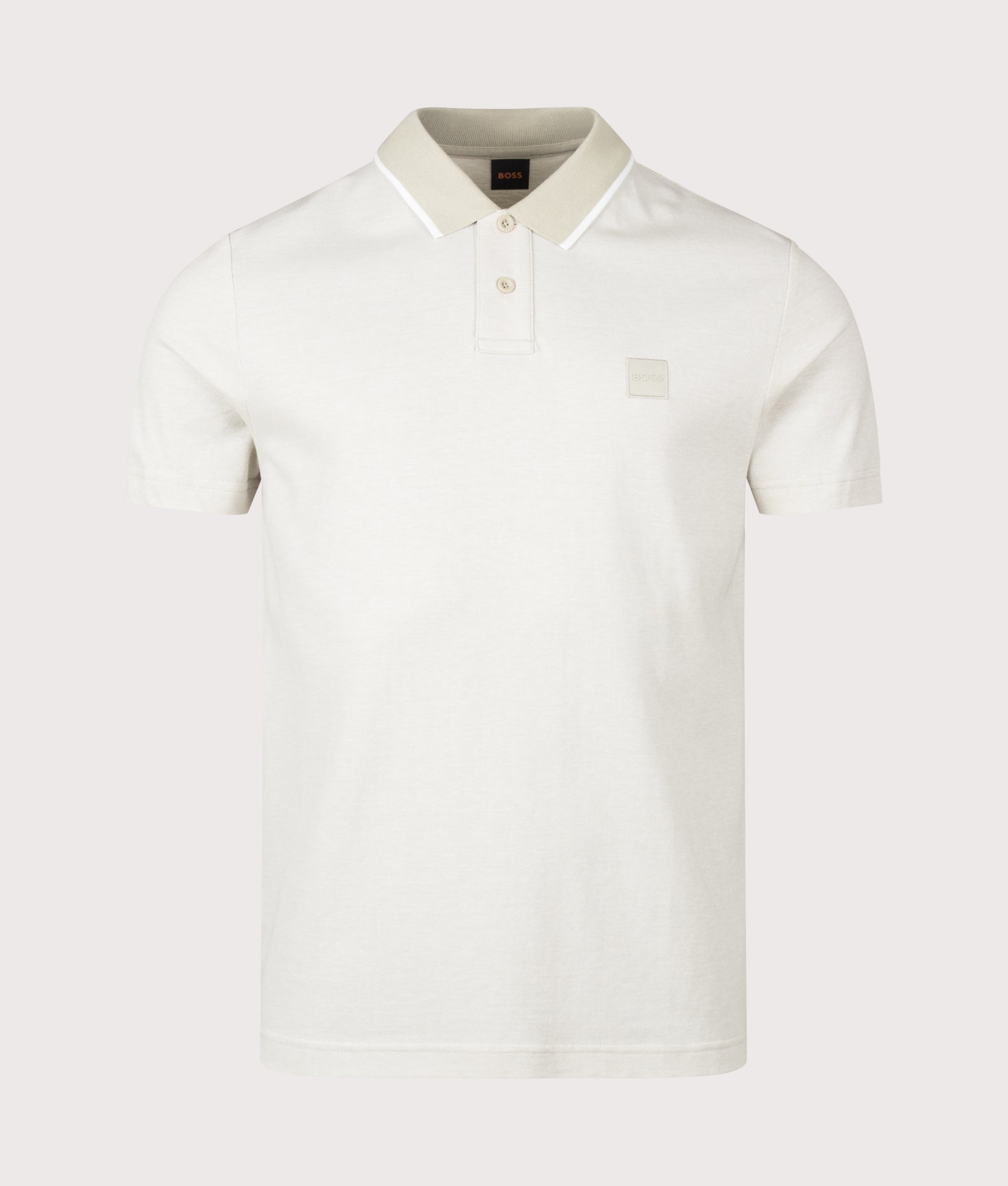 BOSS Passerford Polo Shirt in Light Beige at EQVVS Menswear. Front shot.