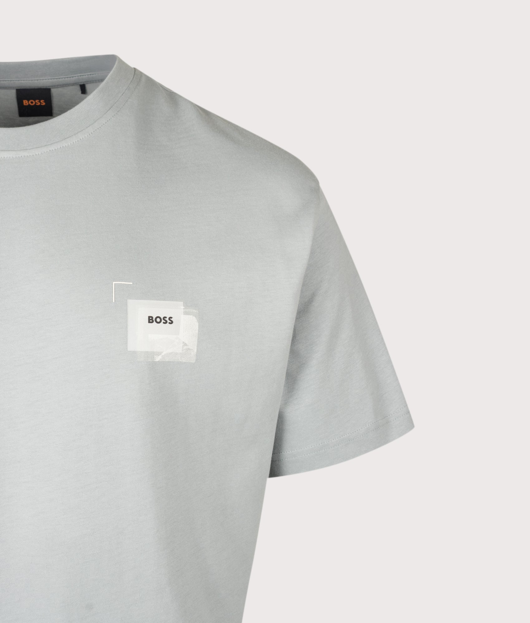 BOSS Relaxed Fit Te Frame T-Shirt in Open Grey at EQVVS Menswear. Detail shot.