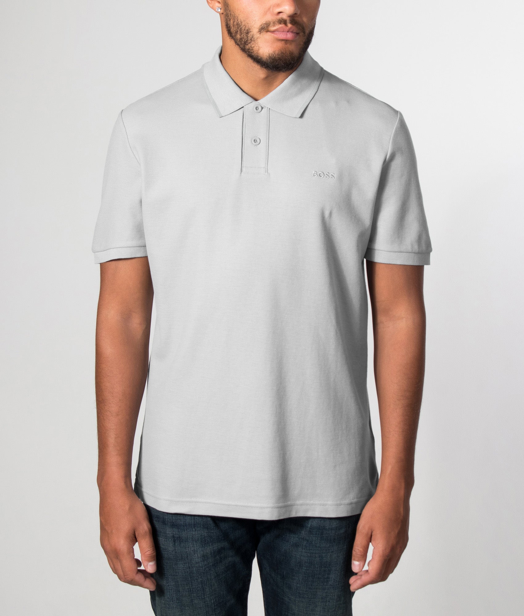 BOSS Regular Fit Phoenix Polo Shirt in Open Grey at EQVVS Menswear. Model front shot.