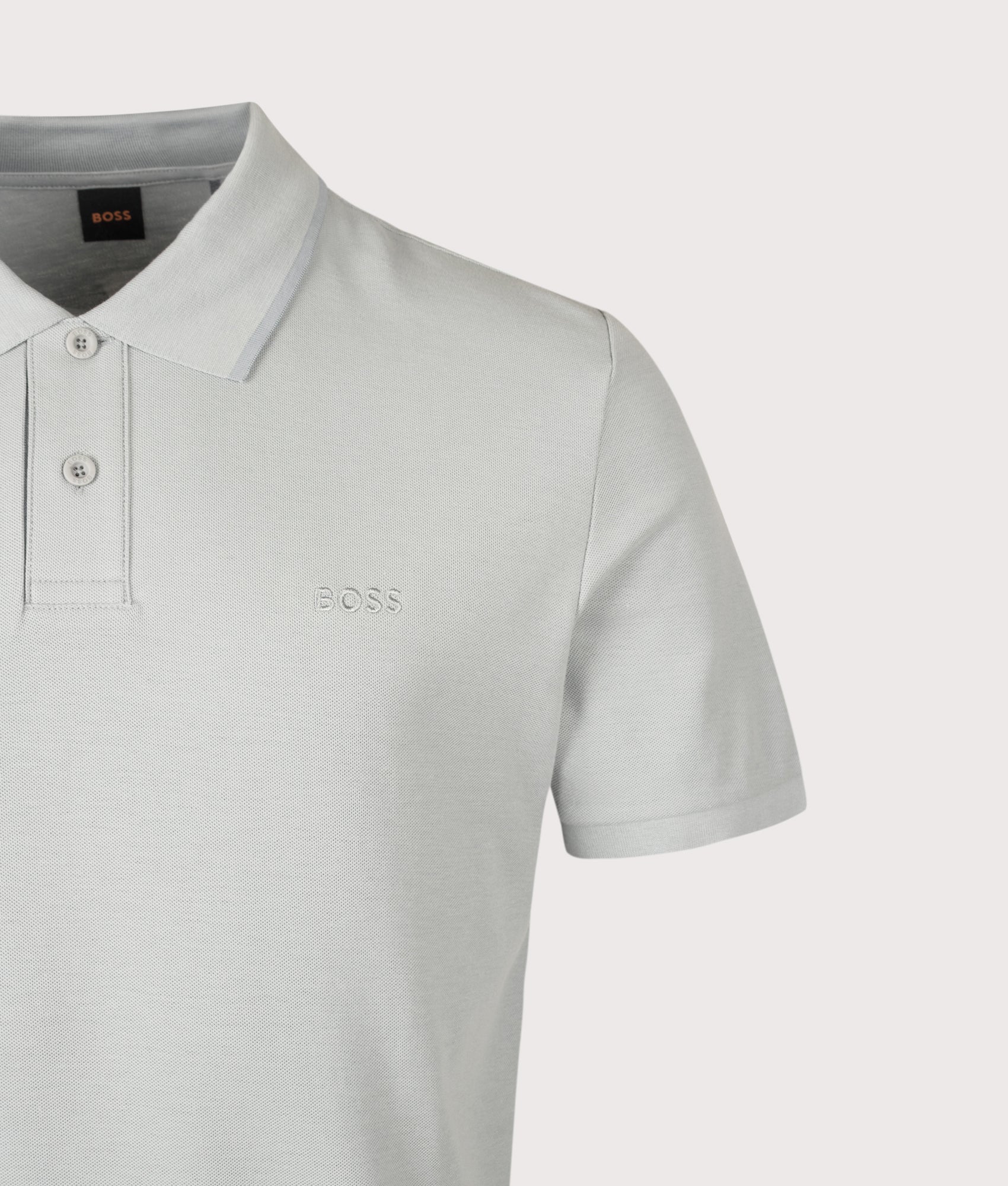 BOSS Regular Fit Phoenix Polo Shirt in Open Grey at EQVVS Menswear. Detail shot.
