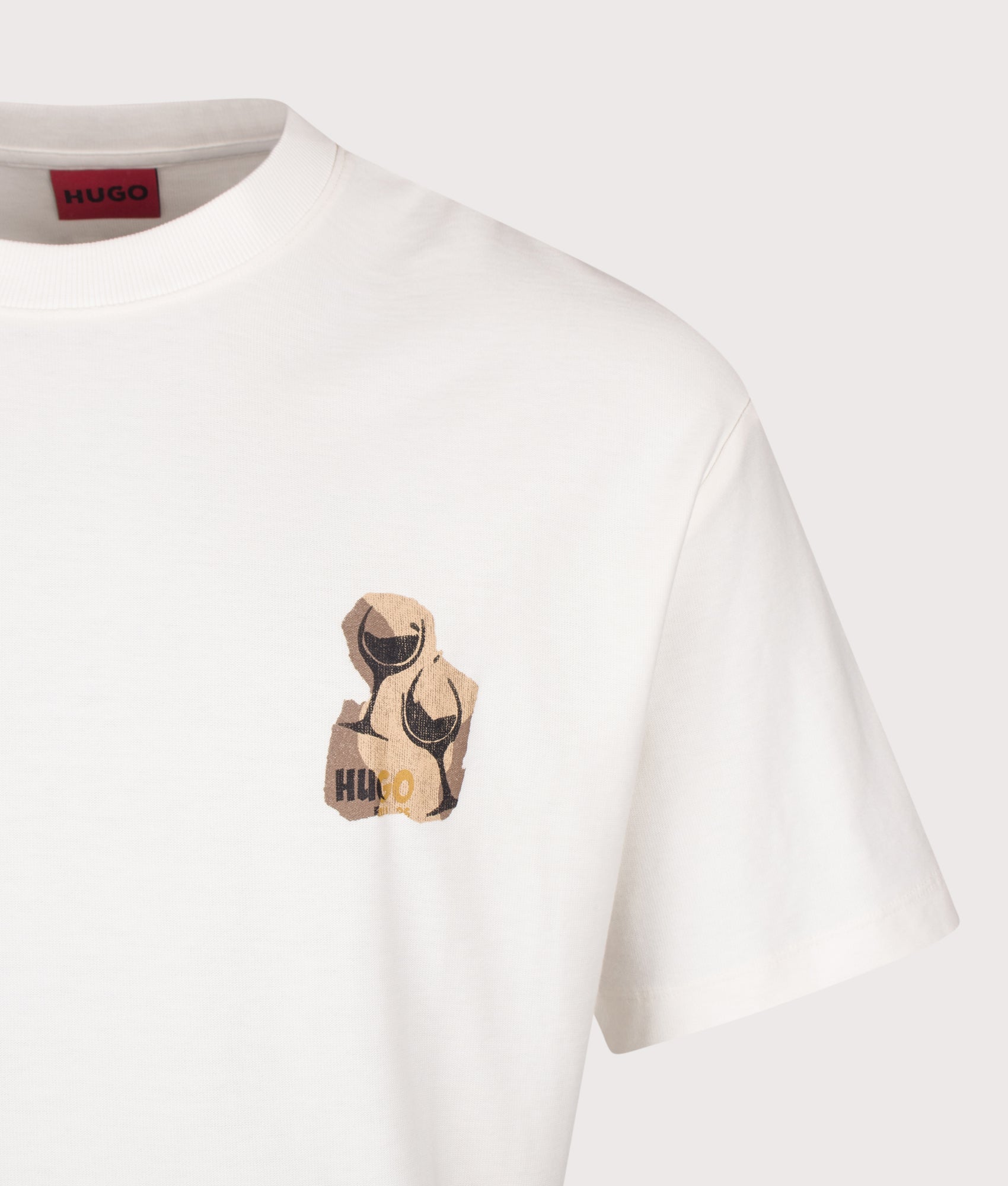 HUGO Relaxed Fit Detzi T-Shirt in Natural at EQVVS Menswear. Detail shot.