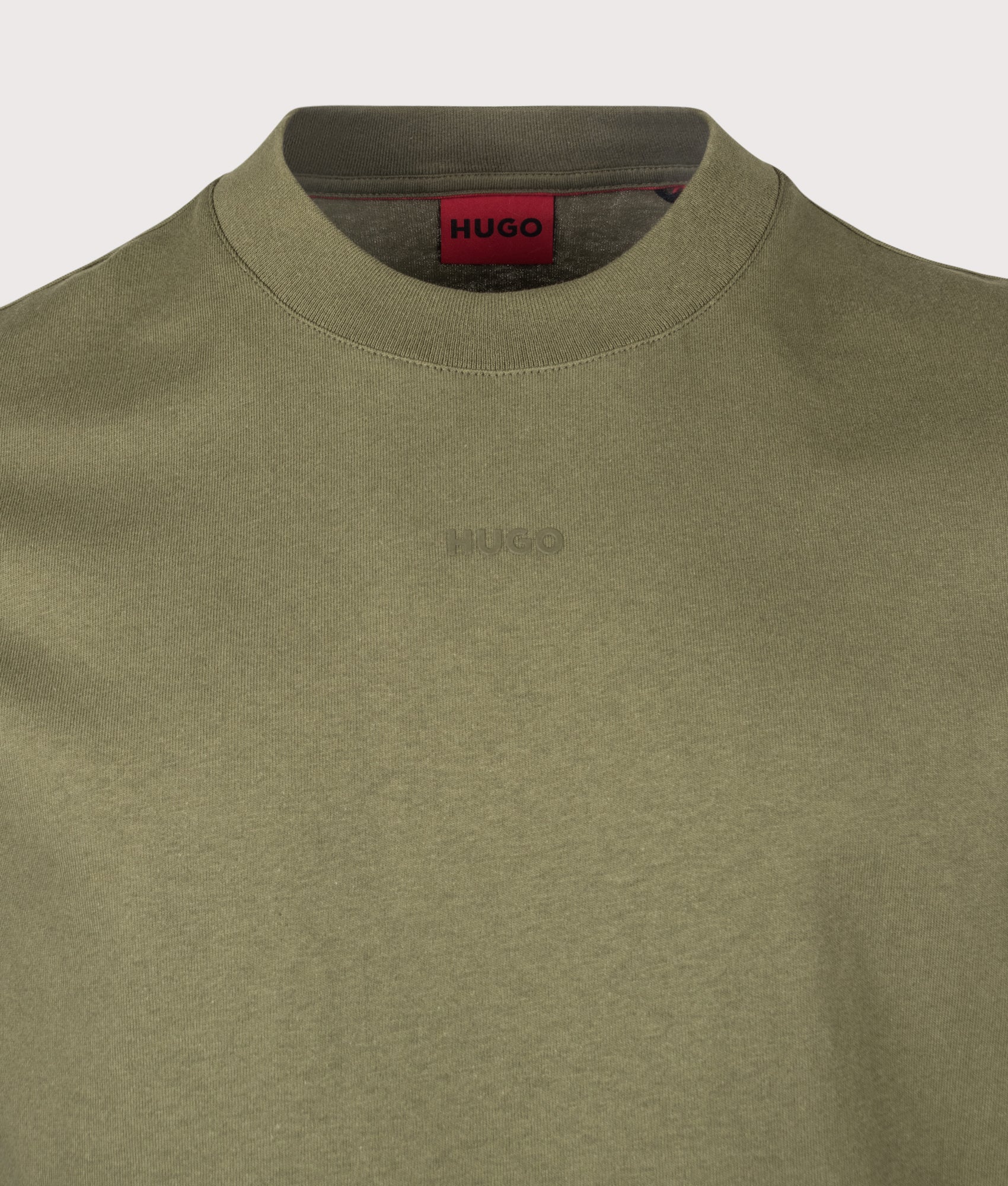 HUGO Relaxed Fit Dapolino T-Shirt in Open Green at EQVVS Menswear. Detail shot.