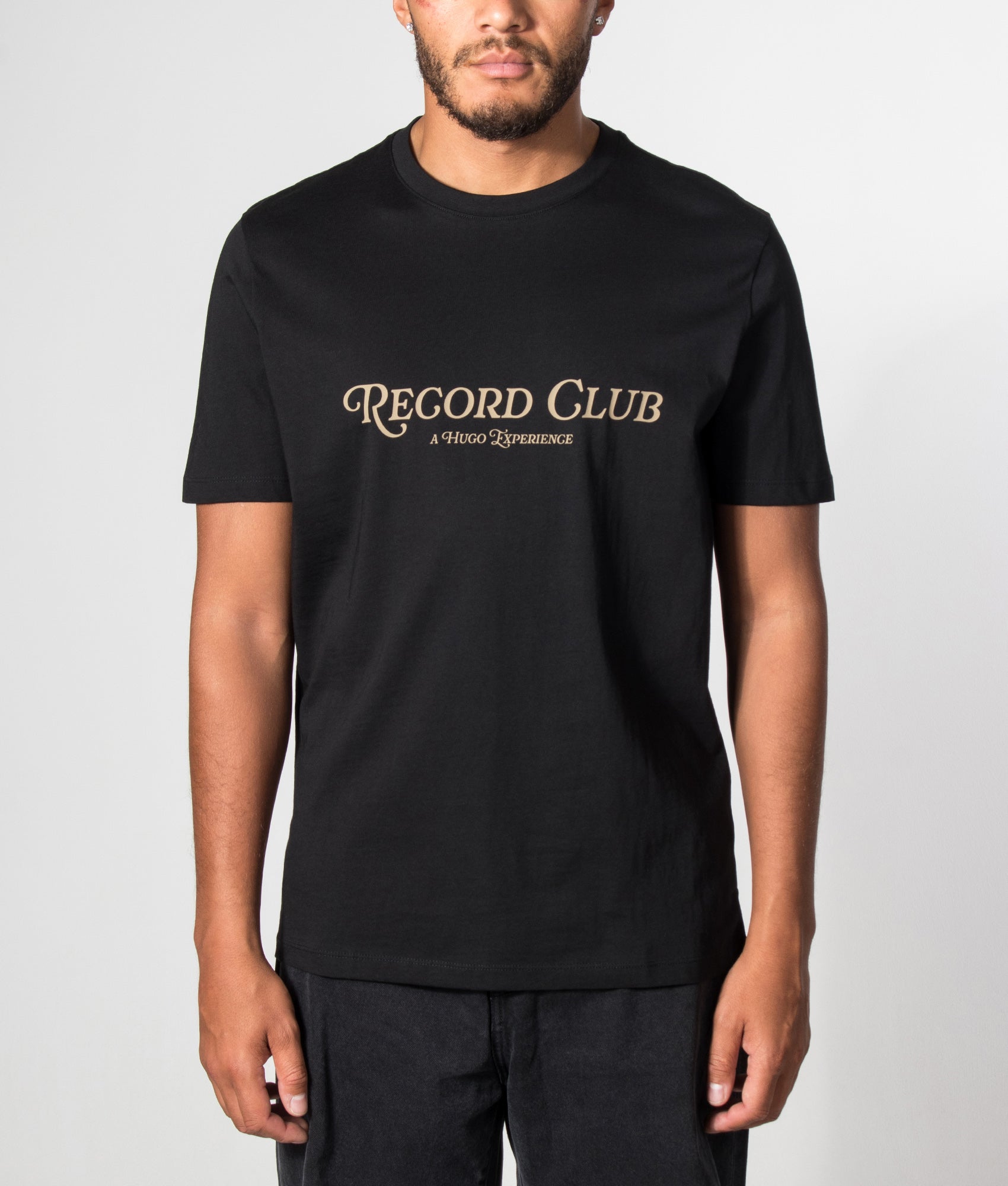 HUGO Regular Fit Durectee T-Shirt in Black at EQVVS Menswear. Model front shot.