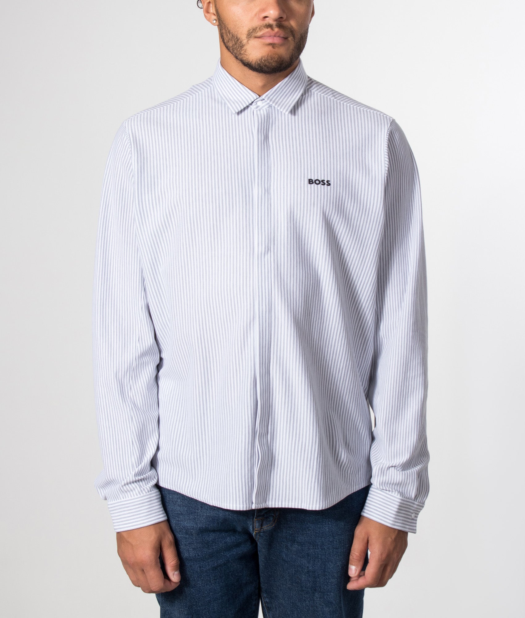BOSS Dymova Shirt in Dark Grey at EQVVS Menswear. Model front shot.
