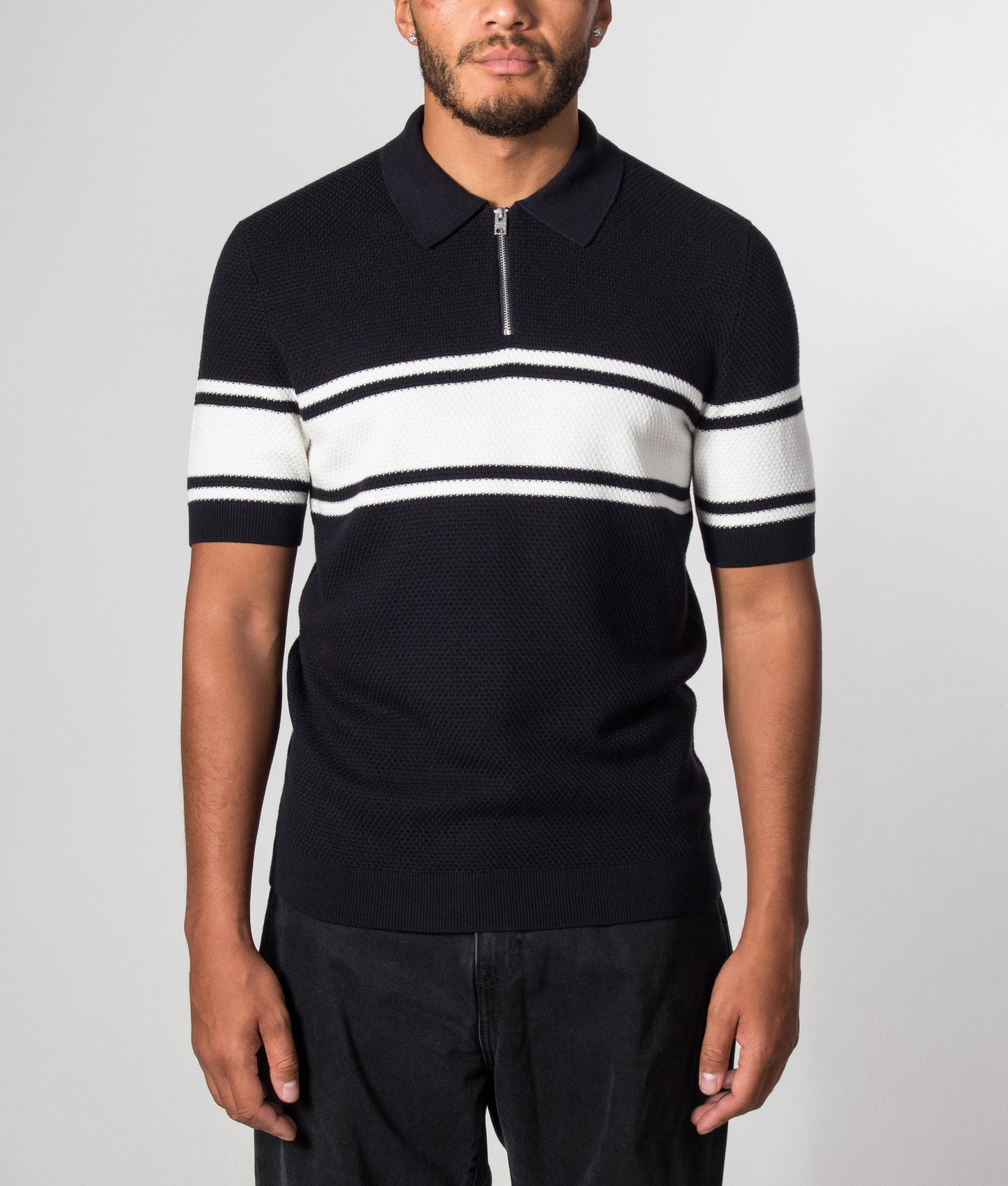 HUGO Regular Fit Sholton Polo Shirt in Dark Blue at EQVVS Menswear. Model front shot.