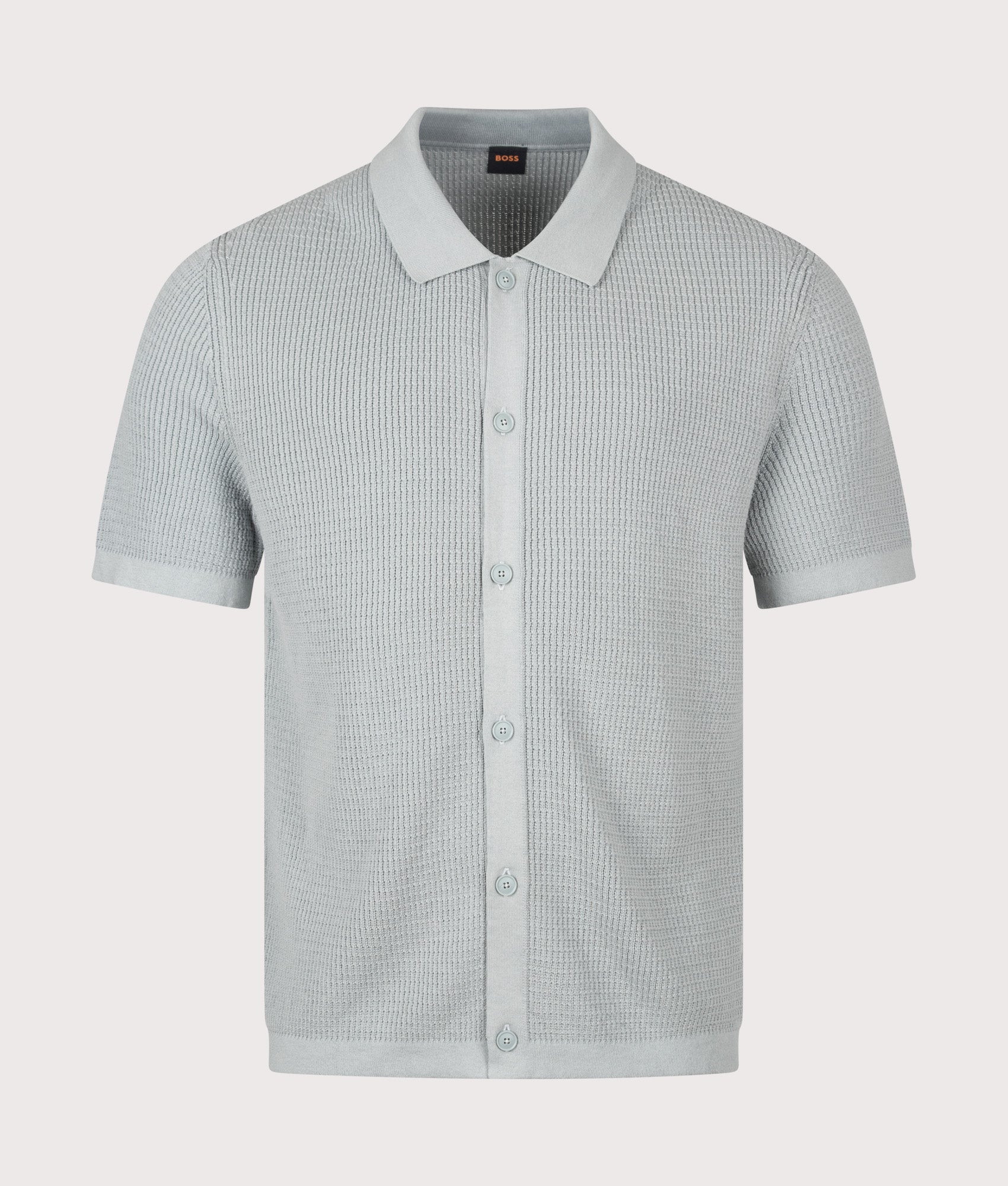 BOSS Relaxed Fit Akepalo Knitted Polo Shirt in Open Grey at EQVVS Menswear. Front shot.