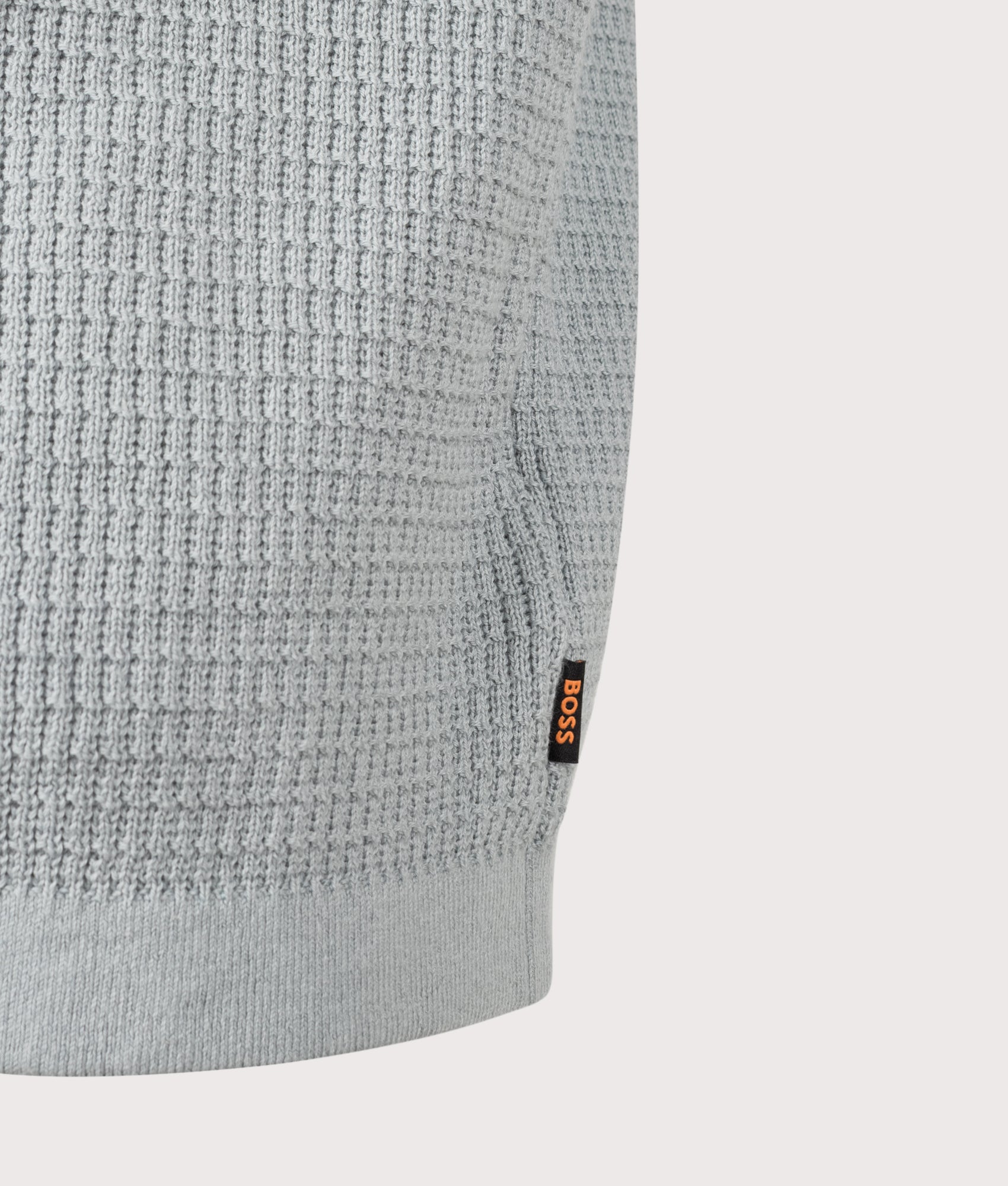 BOSS Relaxed Fit Akepalo Knitted Polo Shirt in Open Grey at EQVVS Menswear. Detail shot.