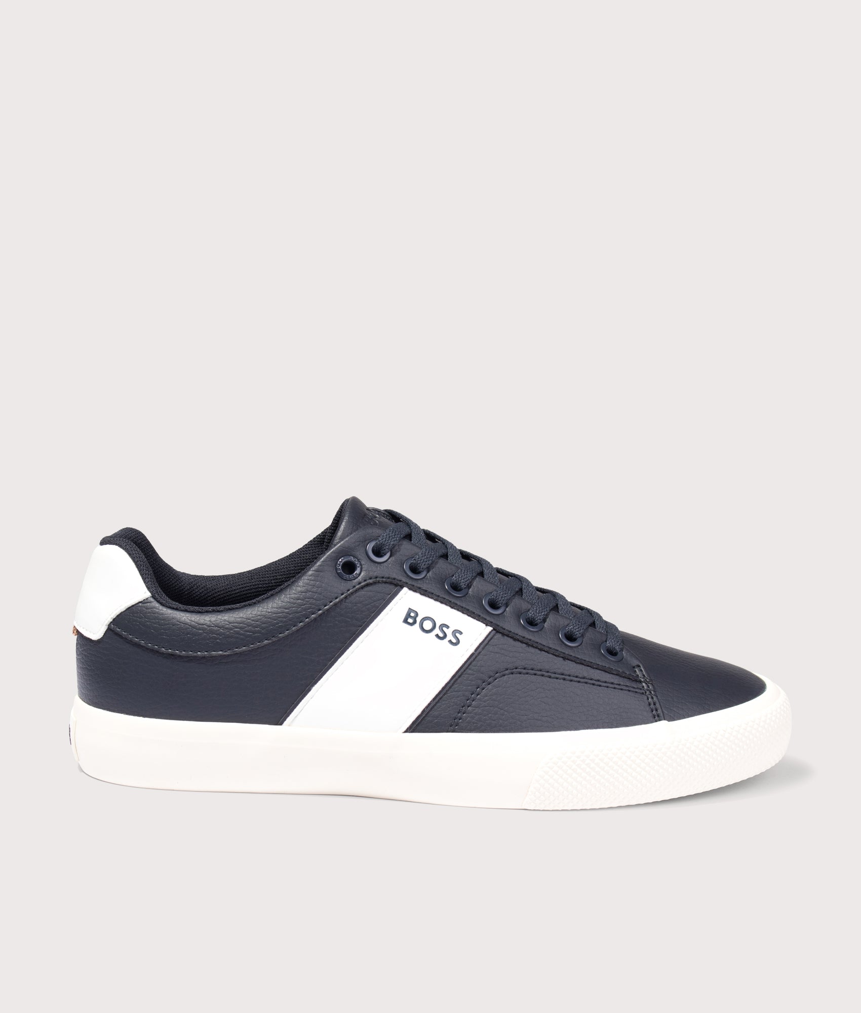 BOSS Aiden Tenn Trainers in Navy at EQVVS Menswear. Side shot.