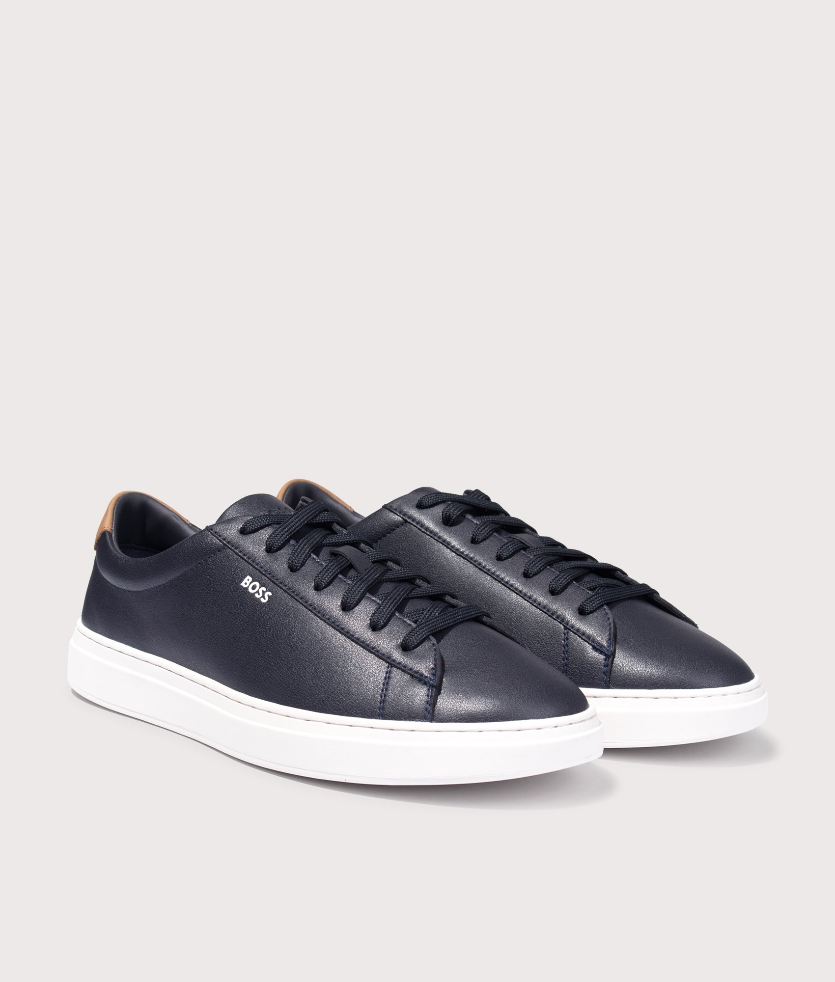 BOSS Kieran Tenn Trainers in Dark Blue at EQVVS Menswear. Angled front shot.