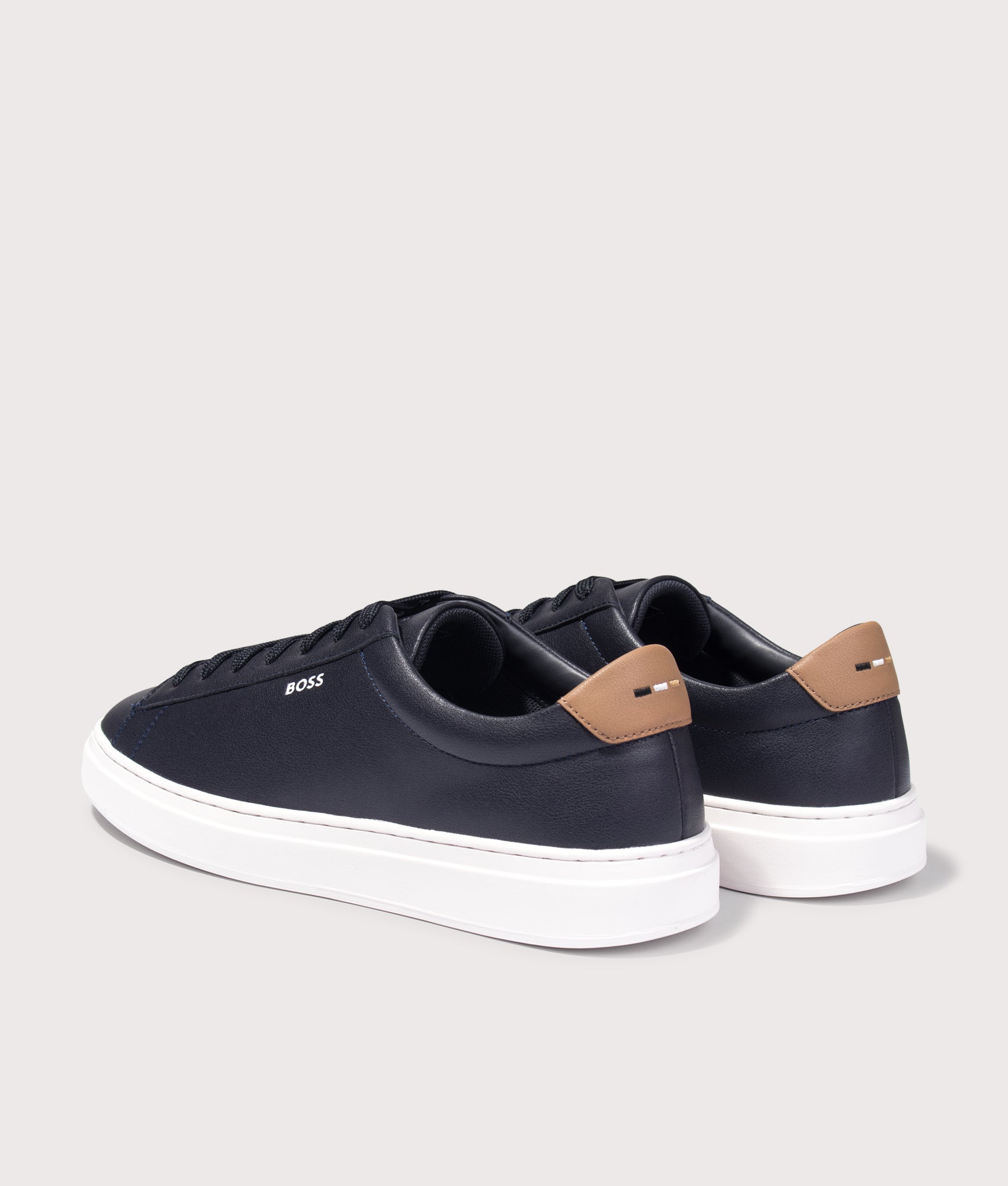 BOSS Kieran Tenn Trainers in Dark Blue at EQVVS Menswear. Angled back shot.