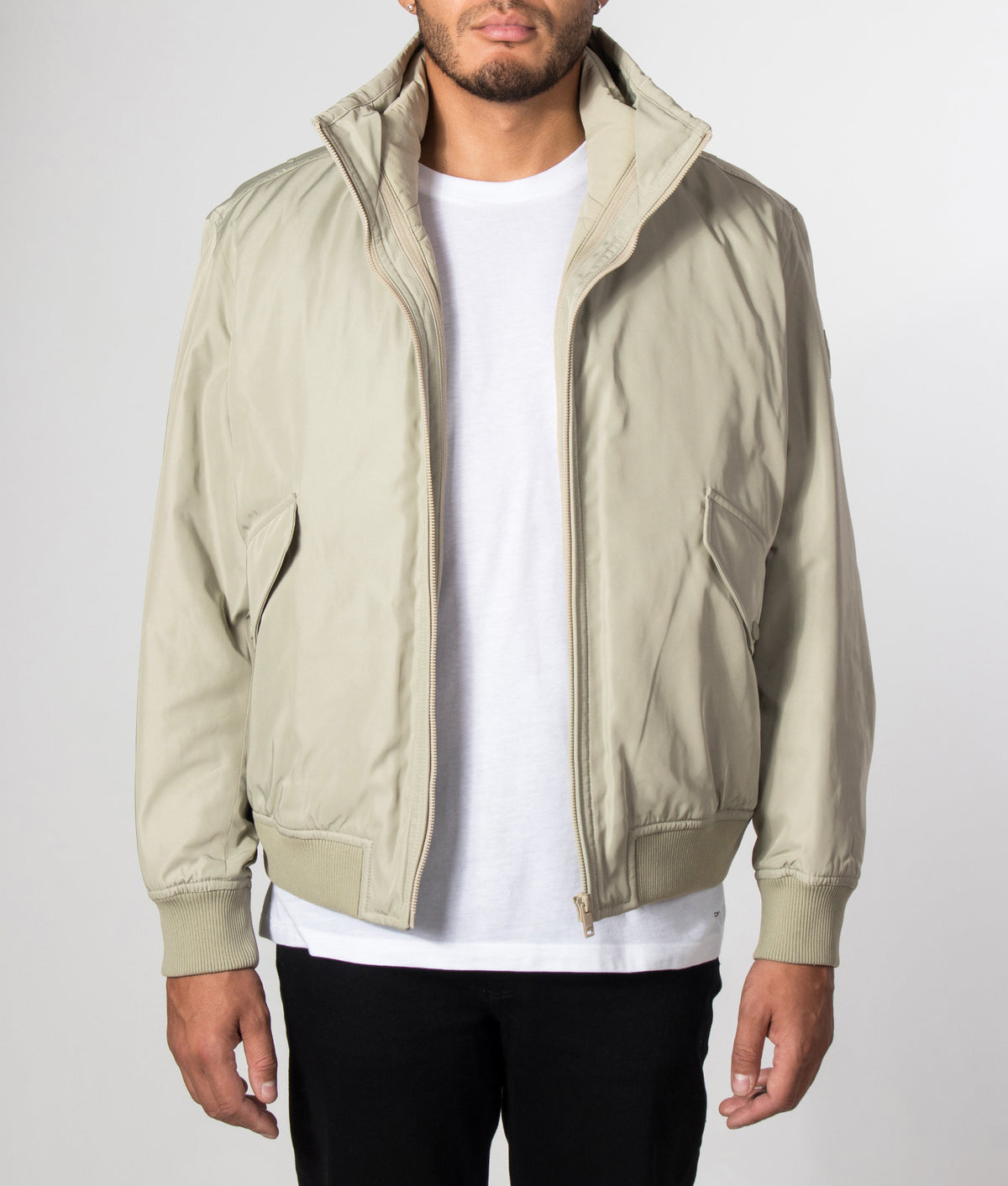 BOSS Relaxed Fit Ojens Jacket in Open Green at EQVVS Menswear. Model front shot.