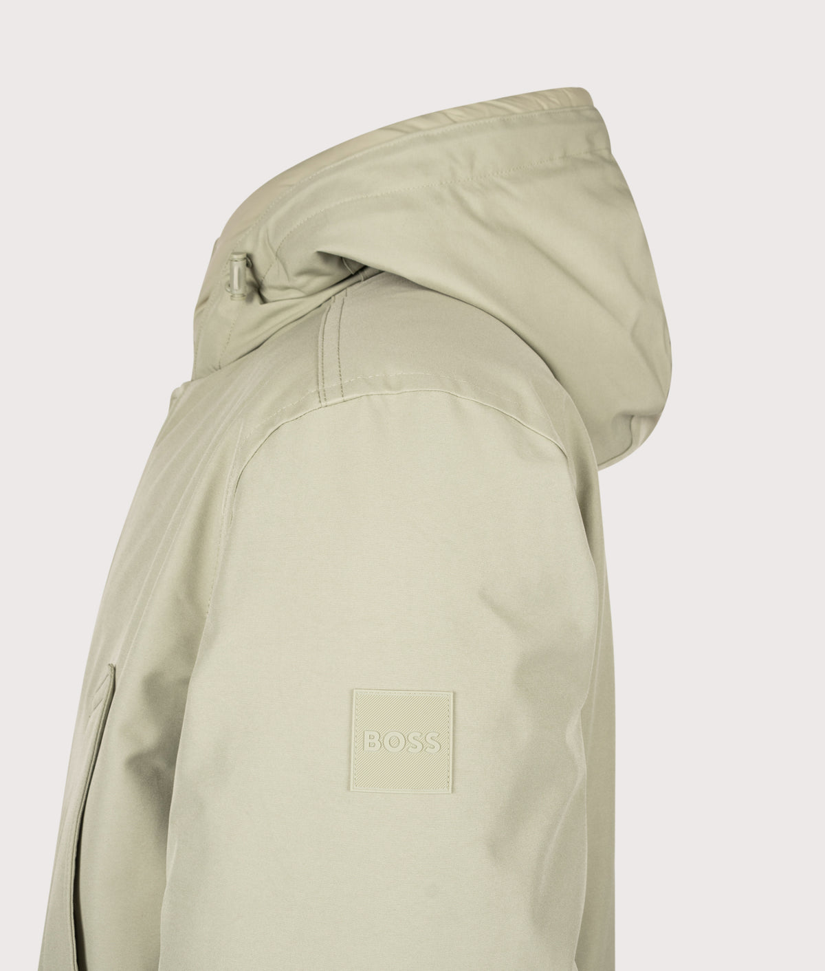 BOSS Regular Fit Osiass1 Parka in Open Green at EQVVS Menswear. Detail shot.
