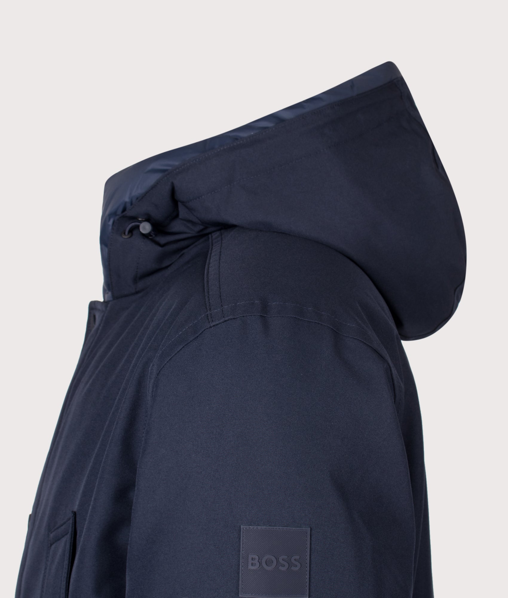 BOSS Regular Fit Osiass1 Parka in Dark Blue at EQVVS Menswear. Detail shot.