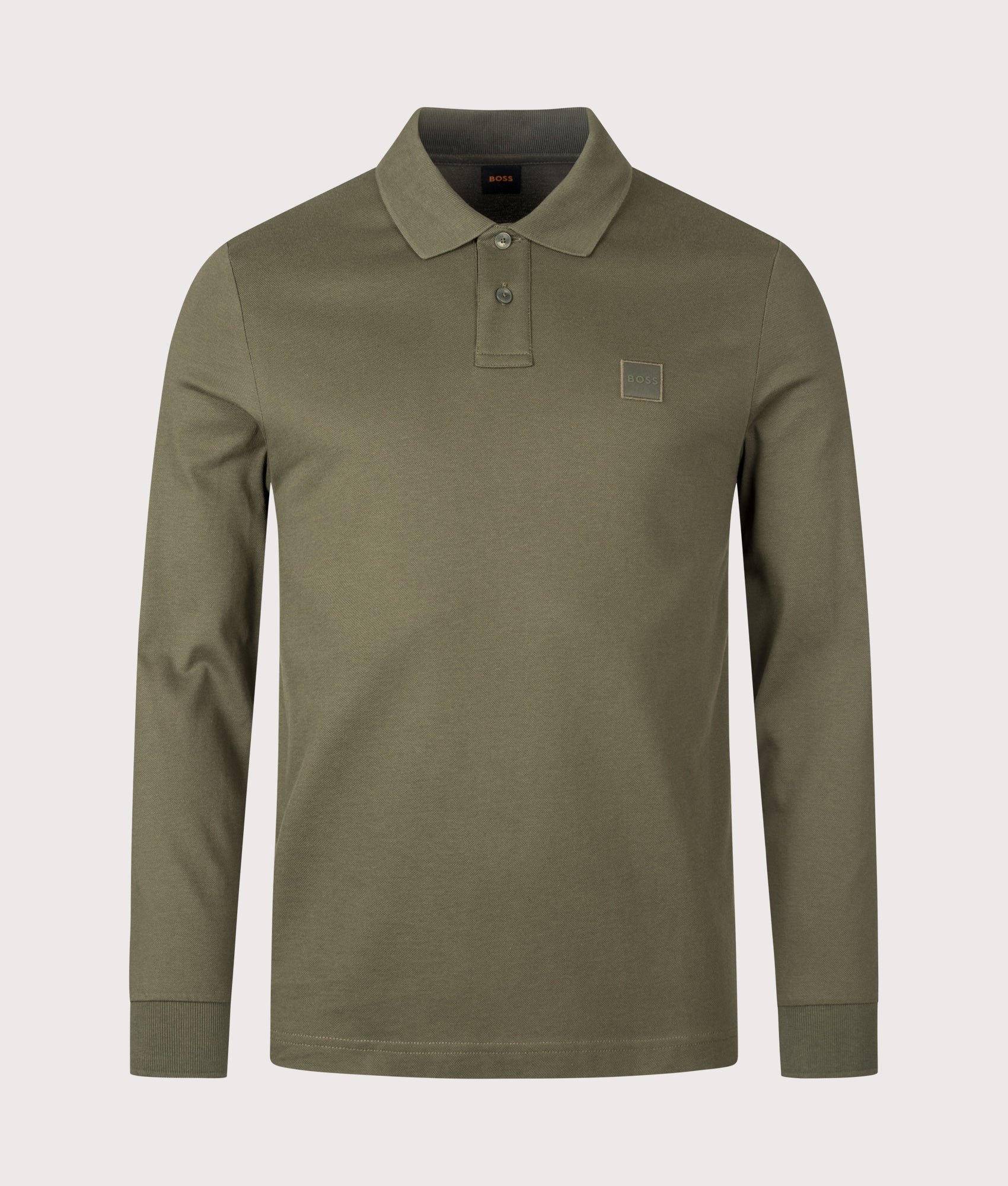 BOSS Slim Fit Passerby Long Sleeve Polo Shirt in Bright Green at EQVVS Menswear. Front shot.