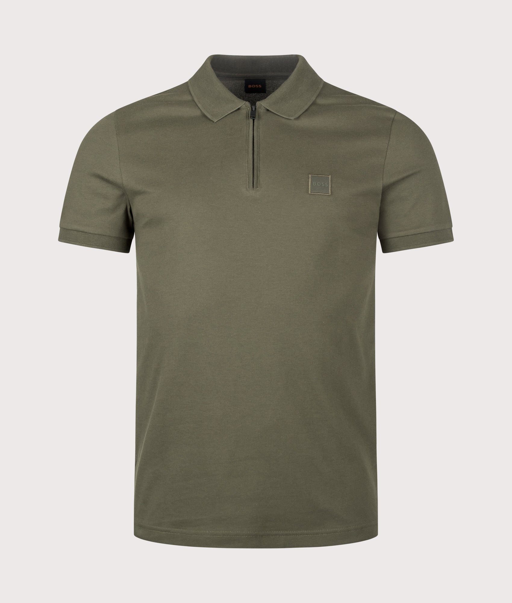 BOSS Slim Fit Passerzip Polo Shirt in Bright Green at EQVVS Menswear. Front shot.