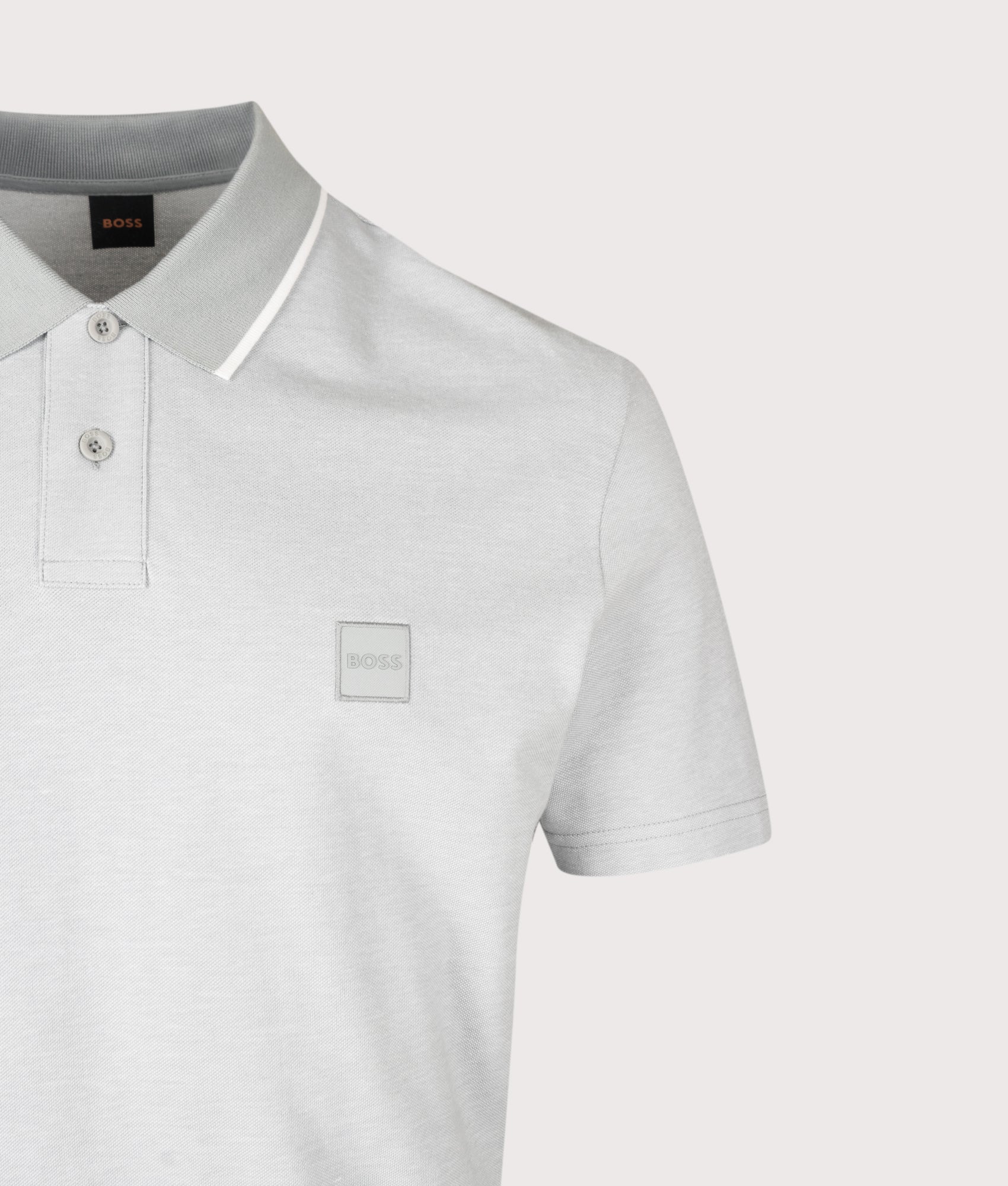 BOSS Regular Fit Passerford Polo Shirt in Open Grey at EQVVS Menswear. Detail shot.