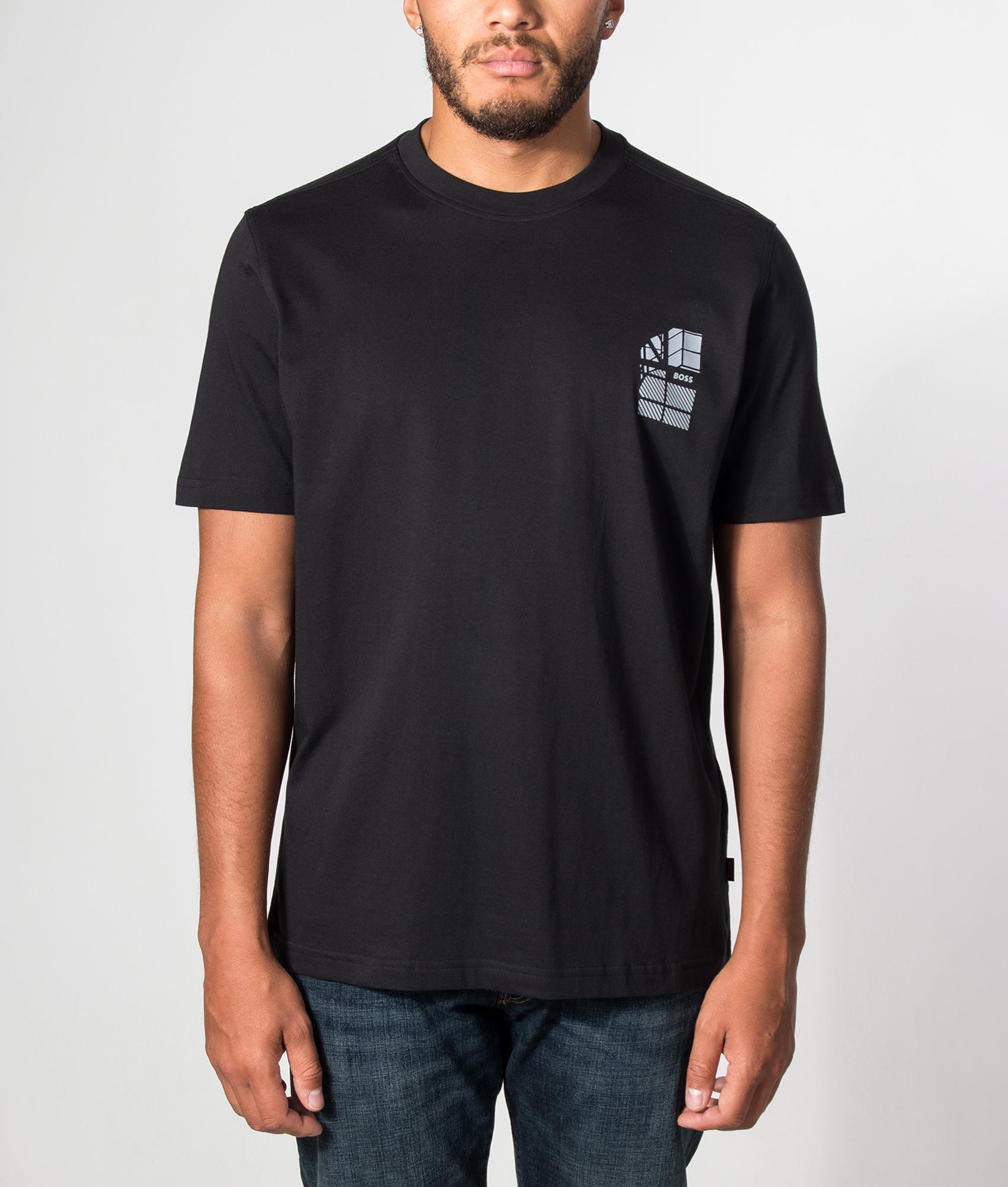 BOSS Regular Fit Te Blueprint T-Shirt in Black at EQVVS Menswear. Model front shot.