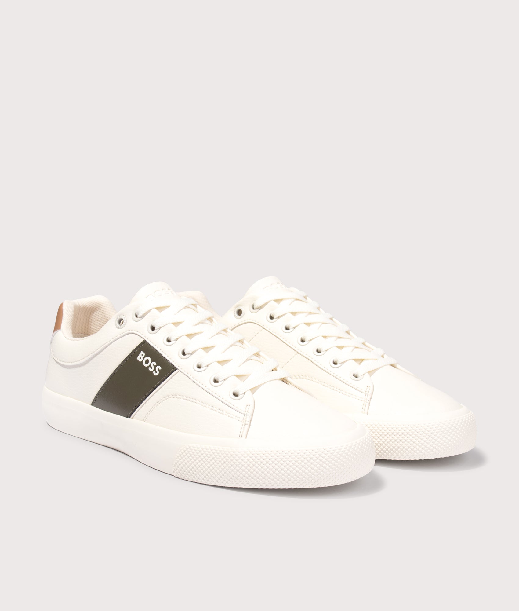 BOSS Aiden Tenn Trainers in Open White at EQVVS Menswear. Angled front shot.