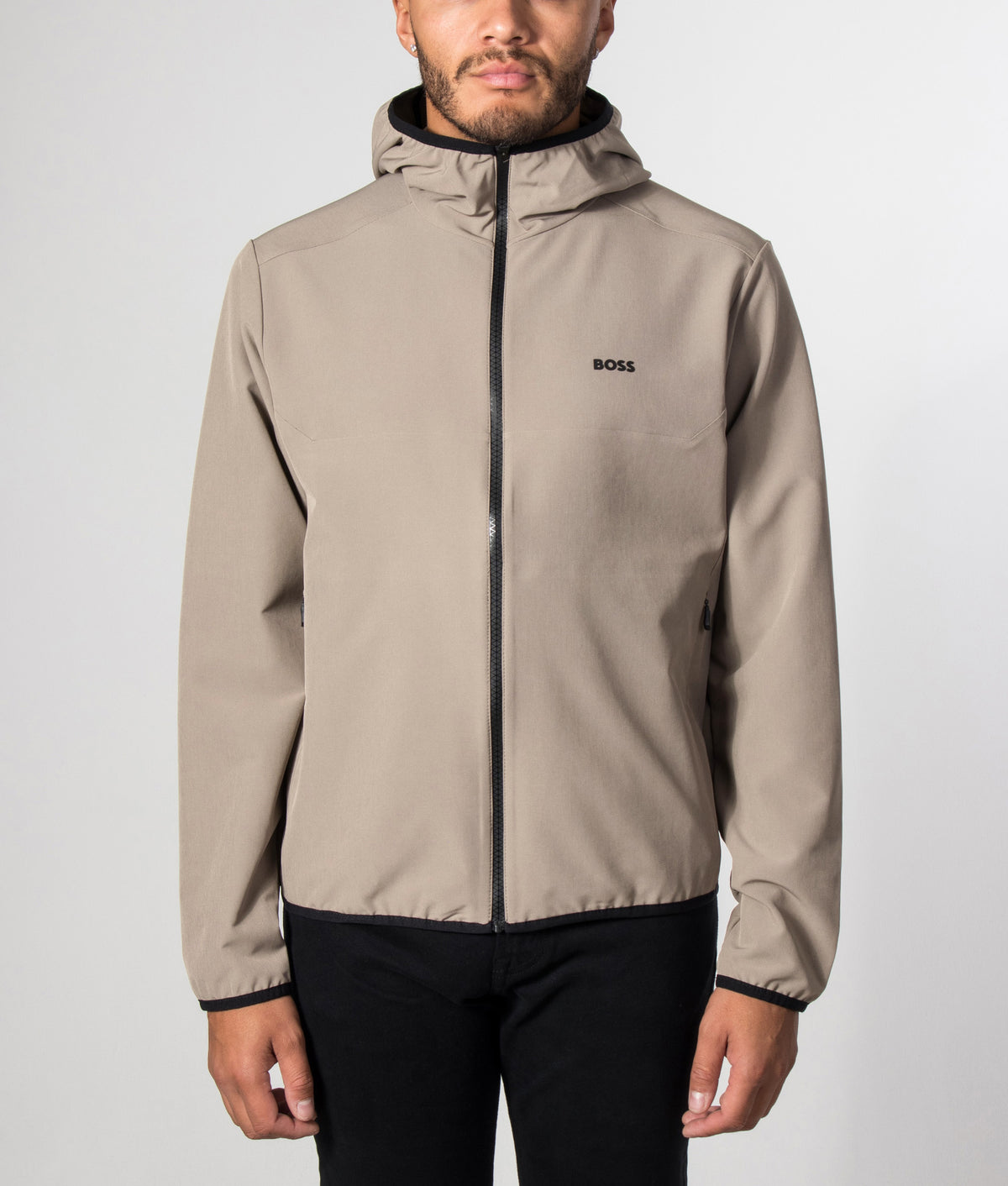 BOSS Slim Fit Commuter Pro Zip Through Hoodie in Light/Pastel Green at EQVVS Menswear. Model front shot.