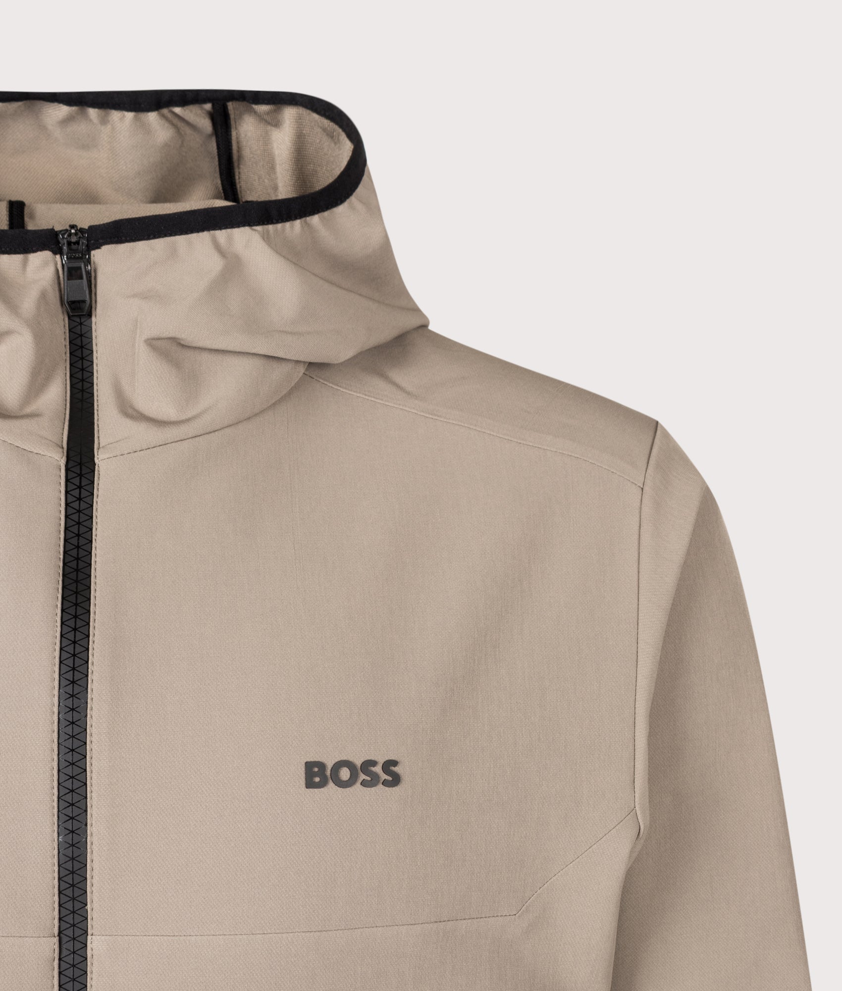 BOSS Slim Fit Commuter Pro Zip Through Hoodie in Light/Pastel Green at EQVVS Menswear. Detail shot.