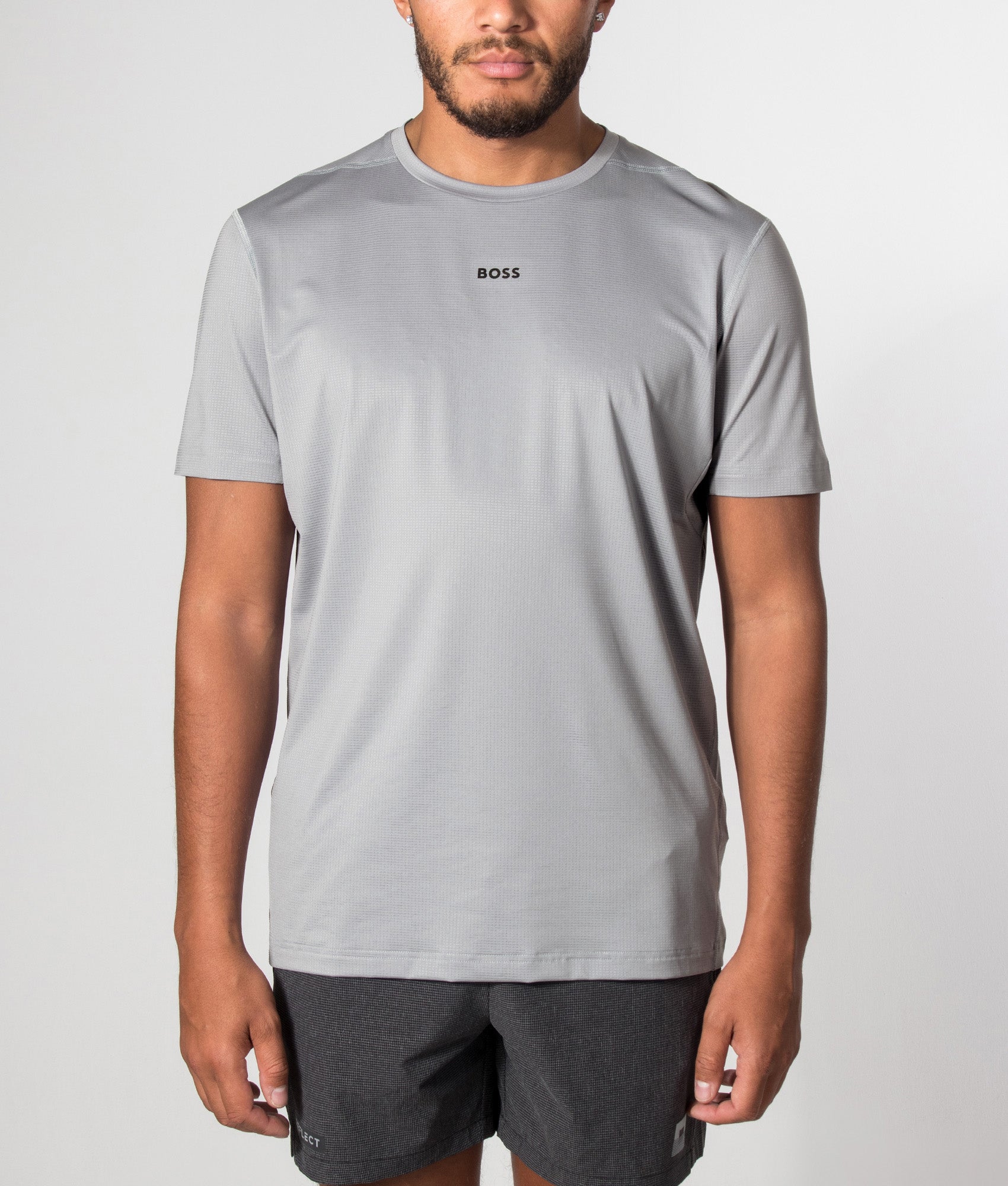 BOSS Slim Fit Active T-Shirt in Dark Grey at EQVVS Menswear. Model front shot.