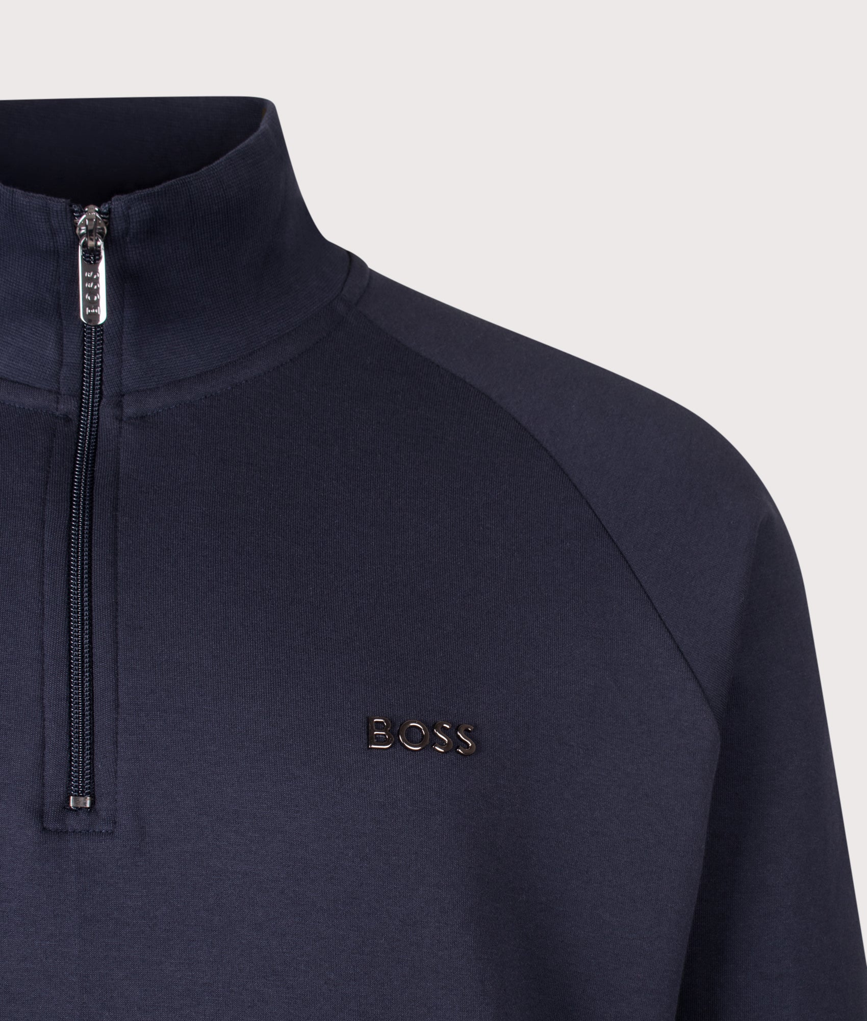 BOSS Regular Fit Sense Quarter Zip Sweatshirt in Dark Blue at EQVVS Menswear. Detail shot.