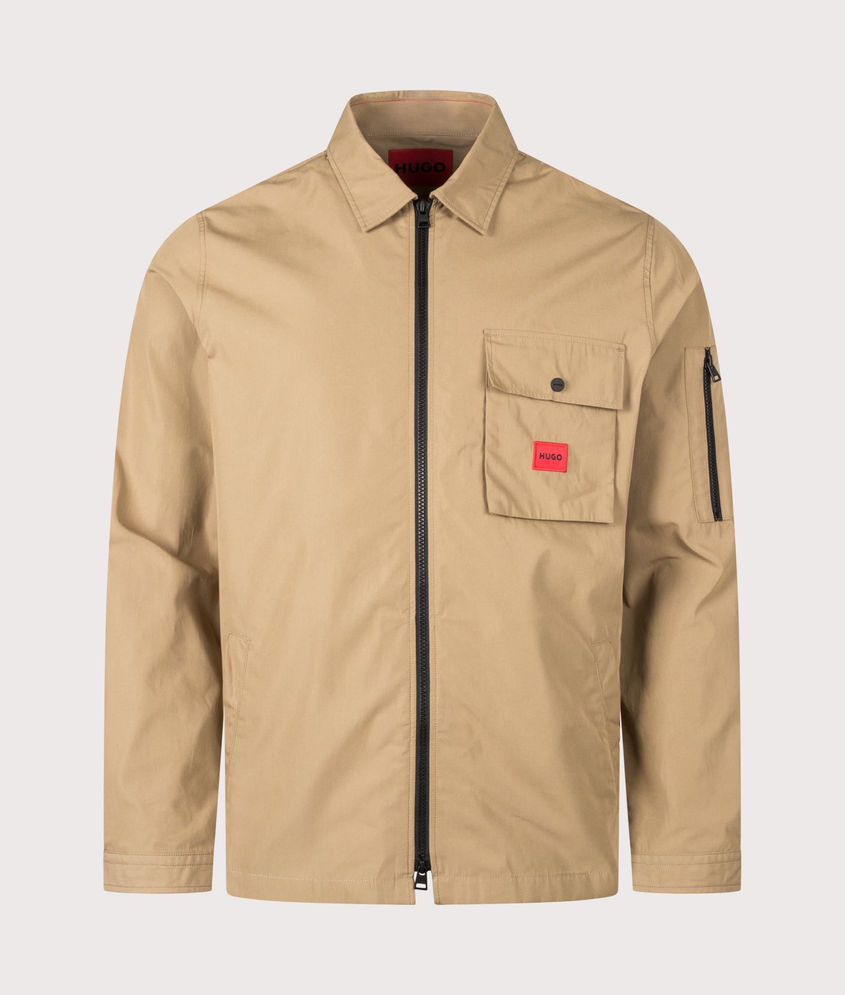 HUGO Relaxed Fit Emmond Zip Through Overshirt in Beige Overflow at EQVVS Menswear. Front shot.