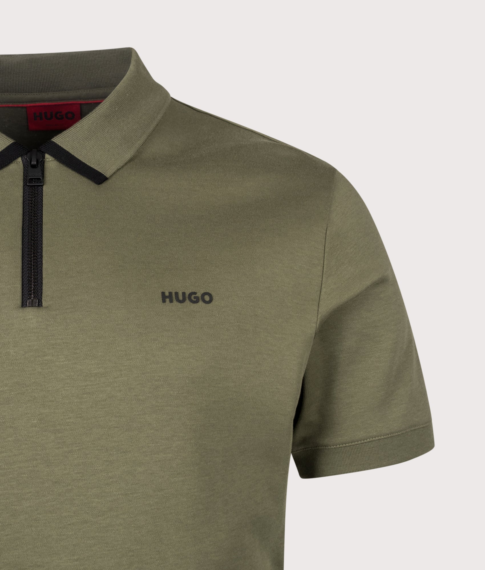HUGO Dalomino Polo Shirt in Open Green at EQVVS Menswear. Detail shot.