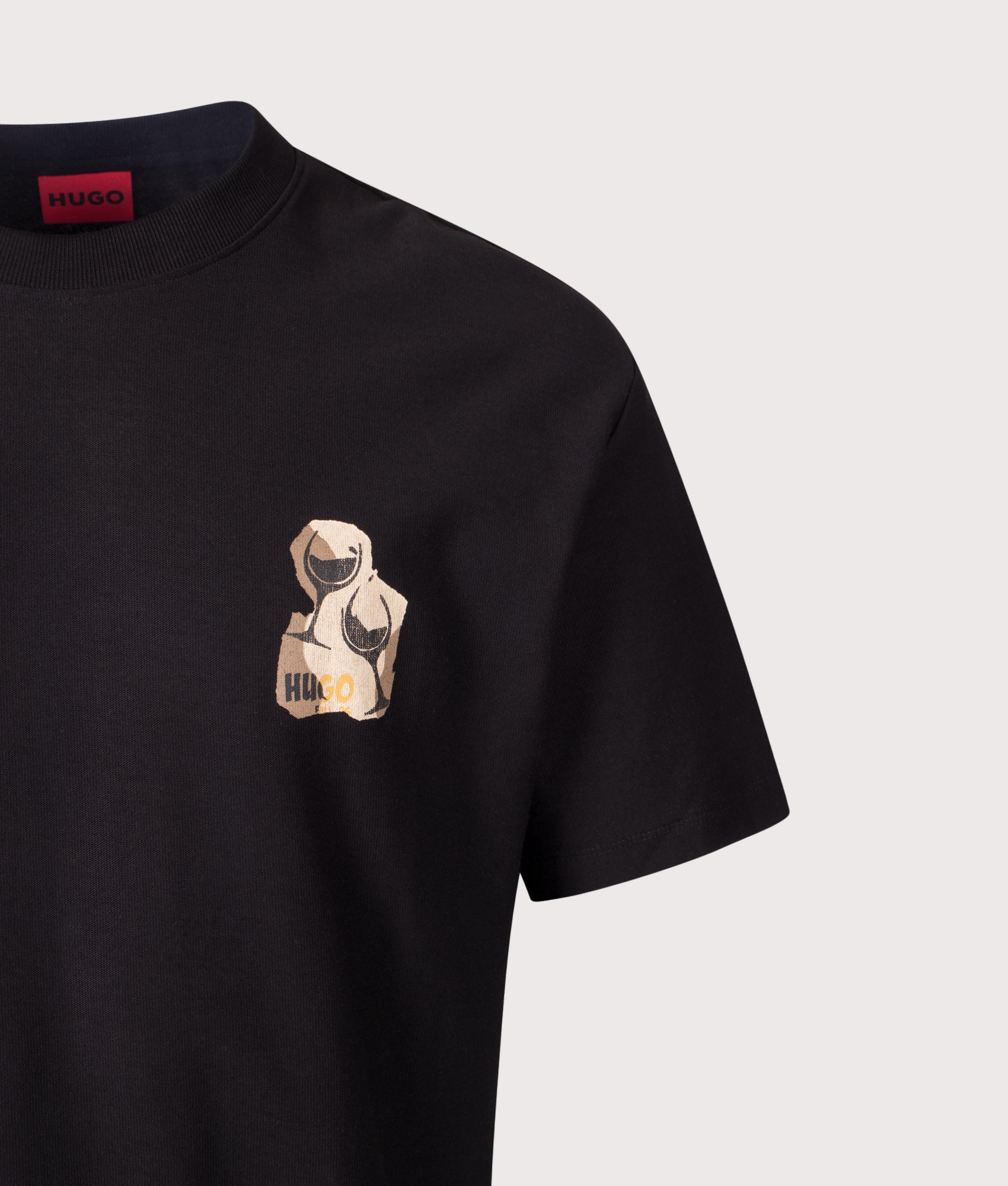 HUGO Relaxed Fit Detzi T-Shirt in Black at EQVVS Menswear. Detail shot.