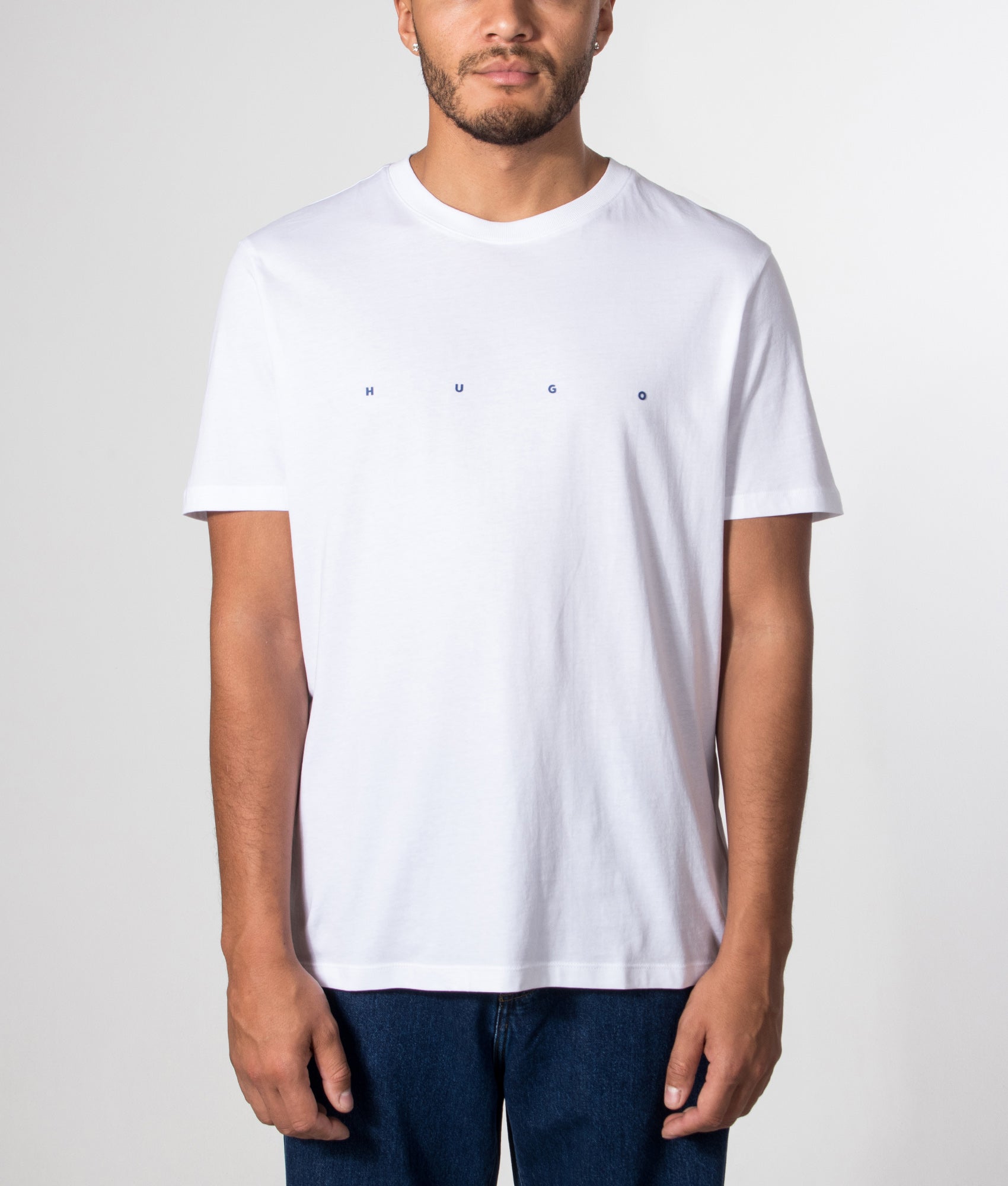 HUGO Regular Fit Dorosi T-Shirt in White at EQVVS Menswear. Model front shot.