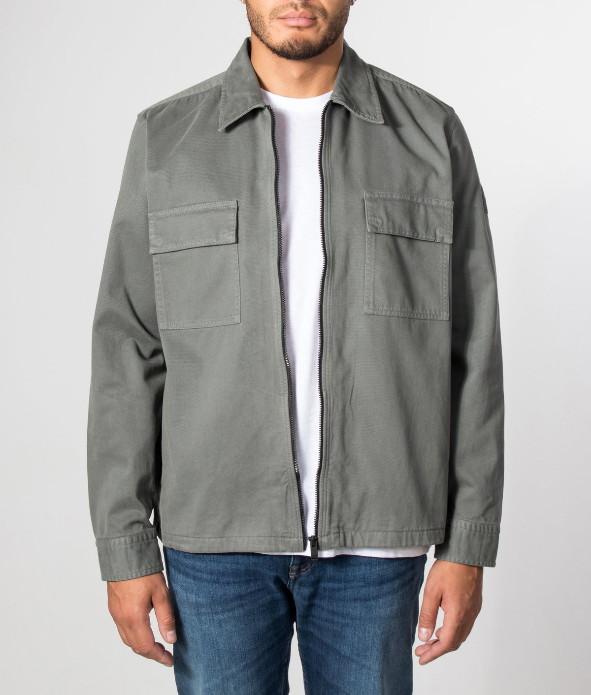 BOSS Oversized Fit Lorum Shirt in Open Green at EQVVS Menswear. Model front shot.