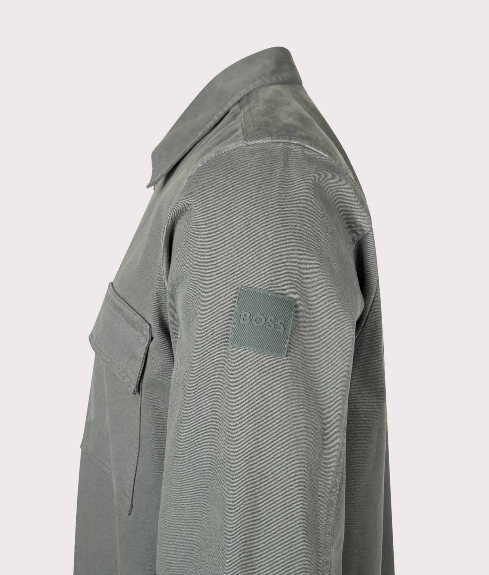 BOSS Oversized Fit Lorum Shirt in Open Green at EQVVS Menswear. Detail shot.
