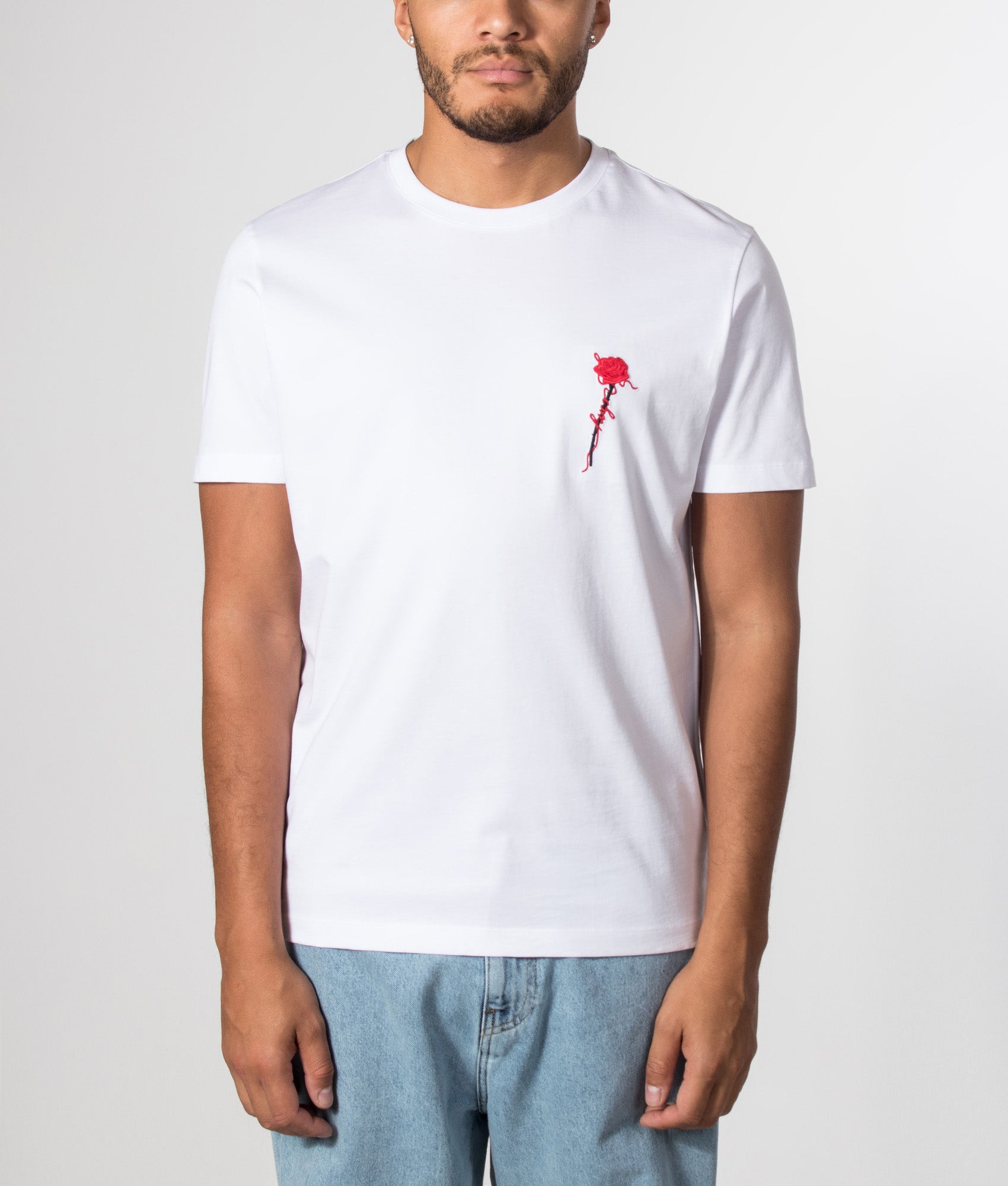HUGO Regular Fit Diflow T-Shirt in White at EQVVS Menswear. Model front shot.