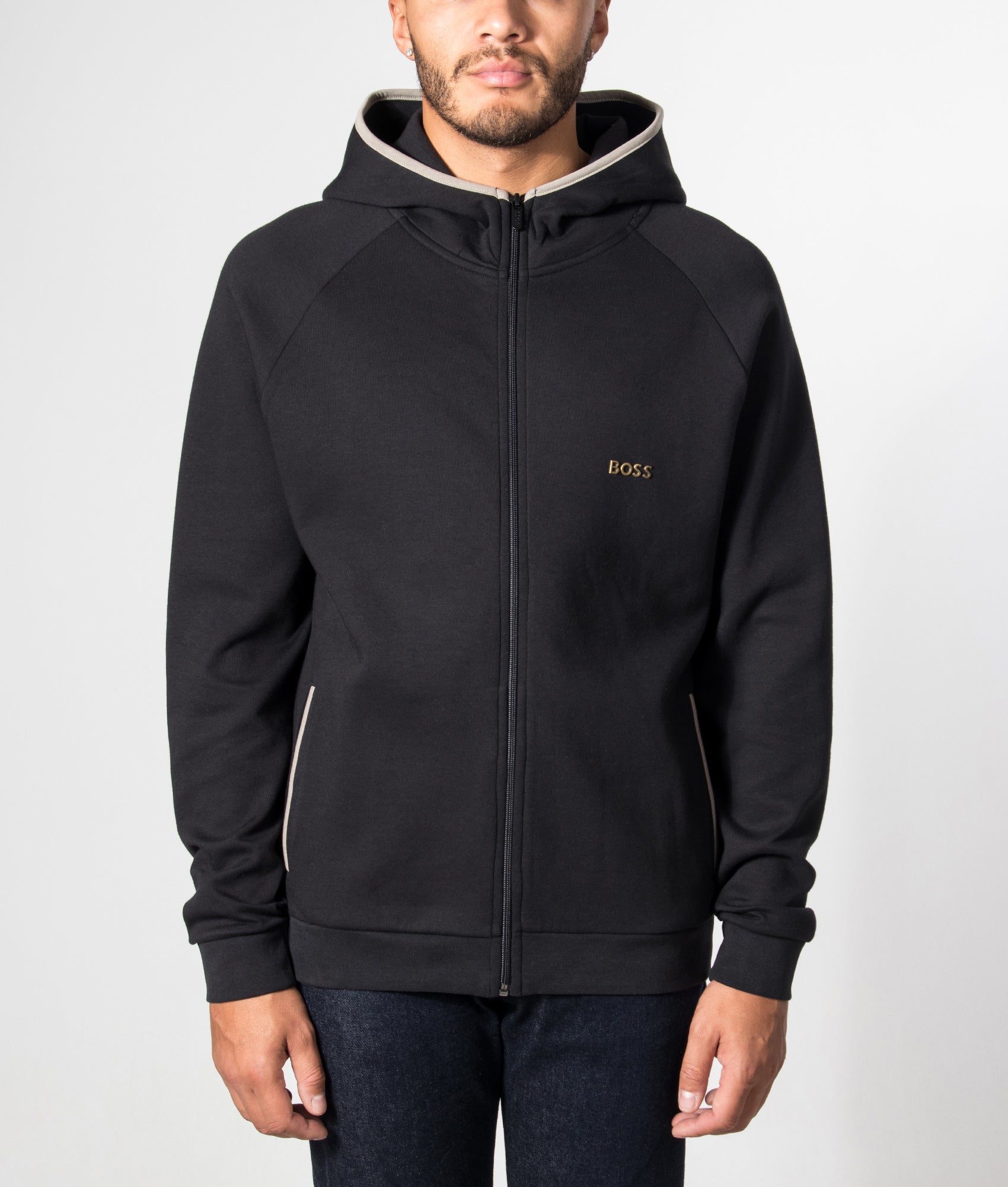 BOSS Regular Fit Sense Zip Through Hoodie in Black at EQVVS Menswear. Model front shot.