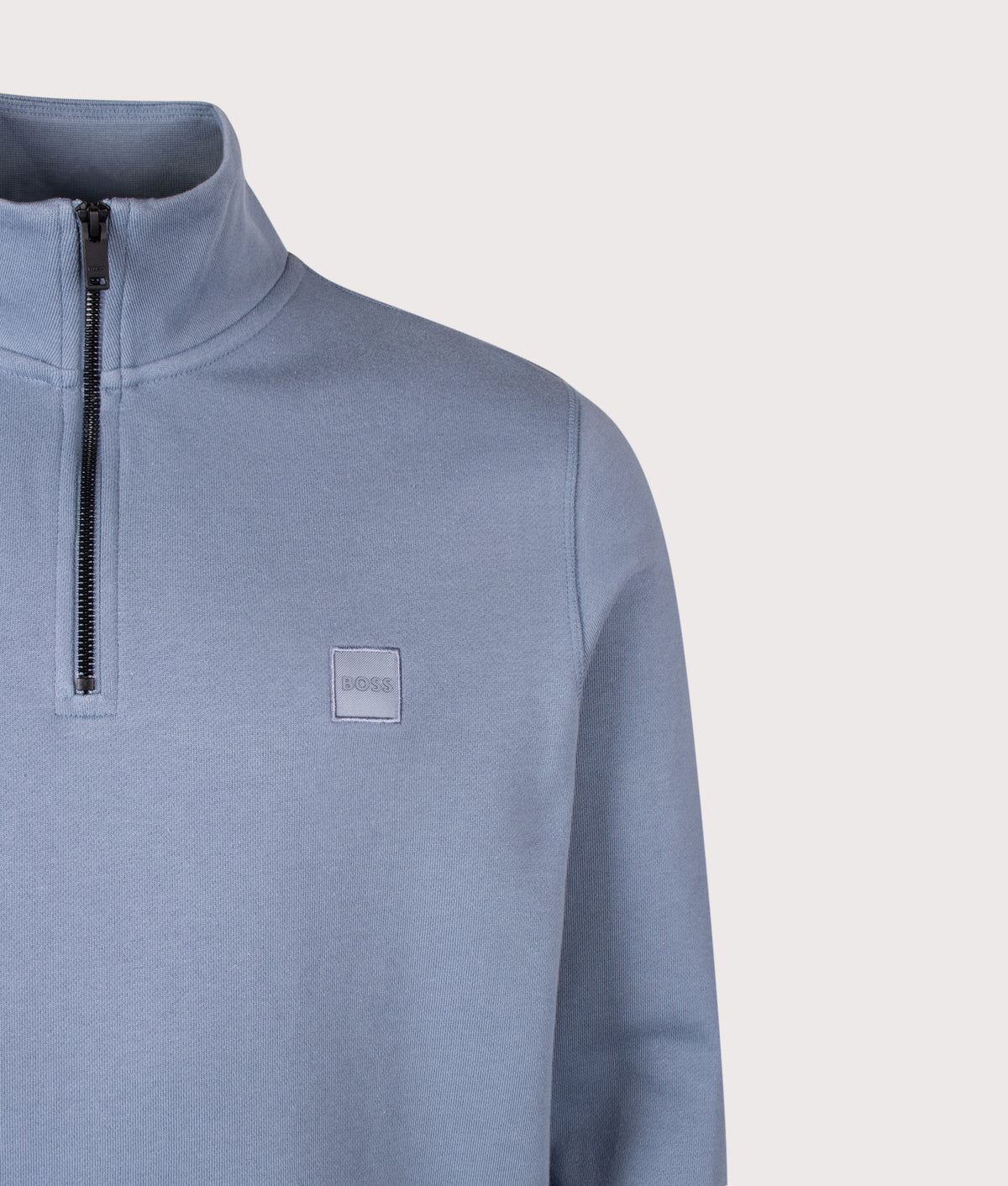 BOSS Regular Fit Zetrust Quarter Zip Sweatshirt in Medium Blue at EQVVS Menswear. Detail shot.