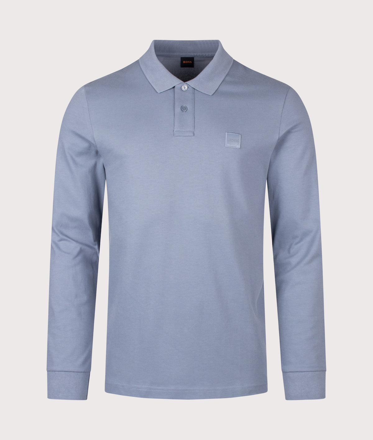 BOSS Slim Fit Passerby Long Sleeve Polo Shirt in Medium Blue at EQVVS Menswear. Front shot.