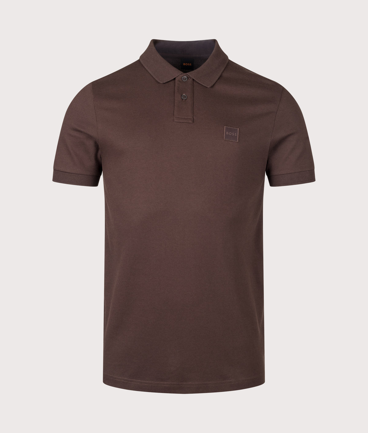 BOSS Slim Fit Passenger Polo Shirt in Dark Brown at EQVVS Menswear. Front shot.